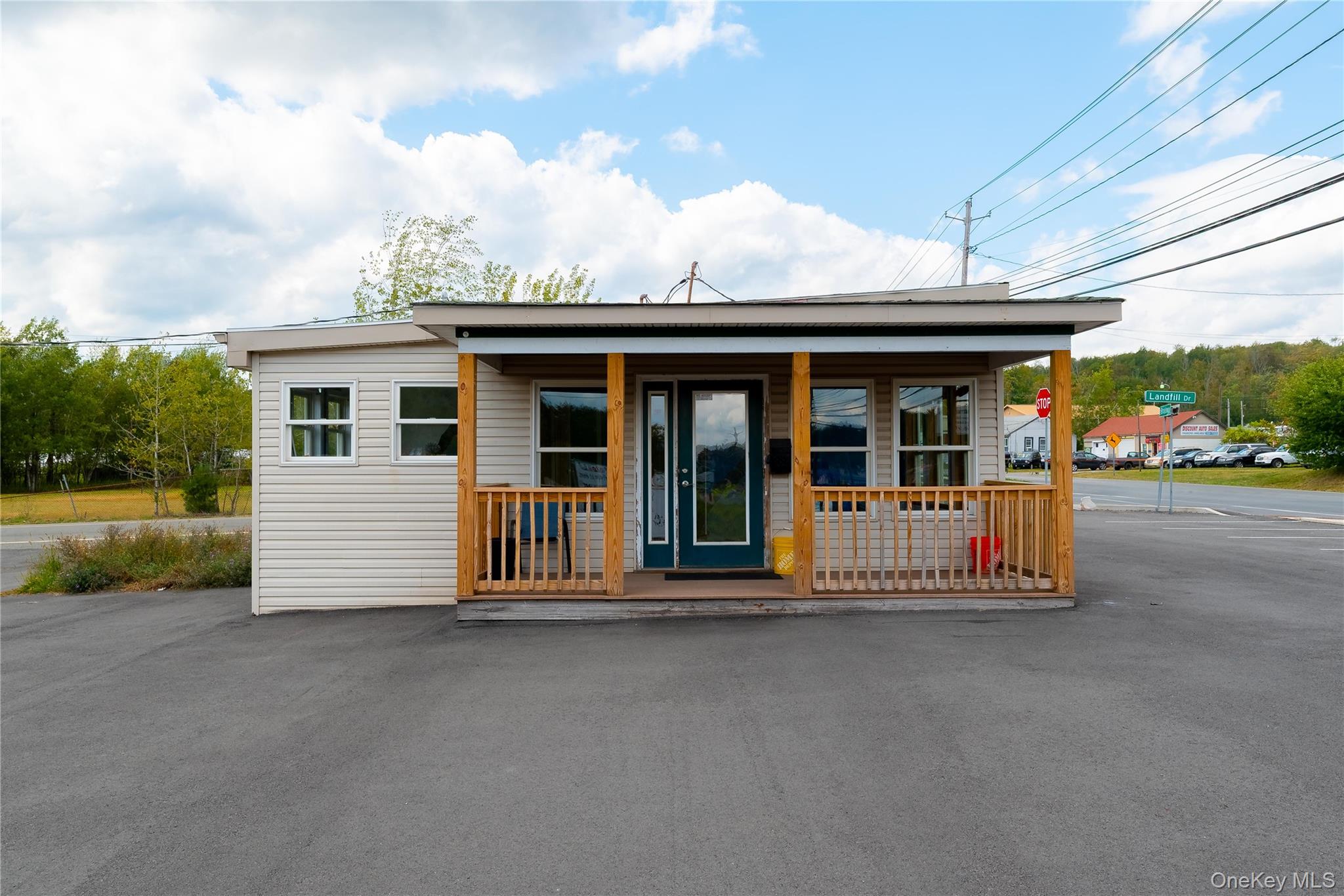 View of front of unit featuring covered porch