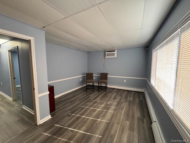 Reception/room with large window.