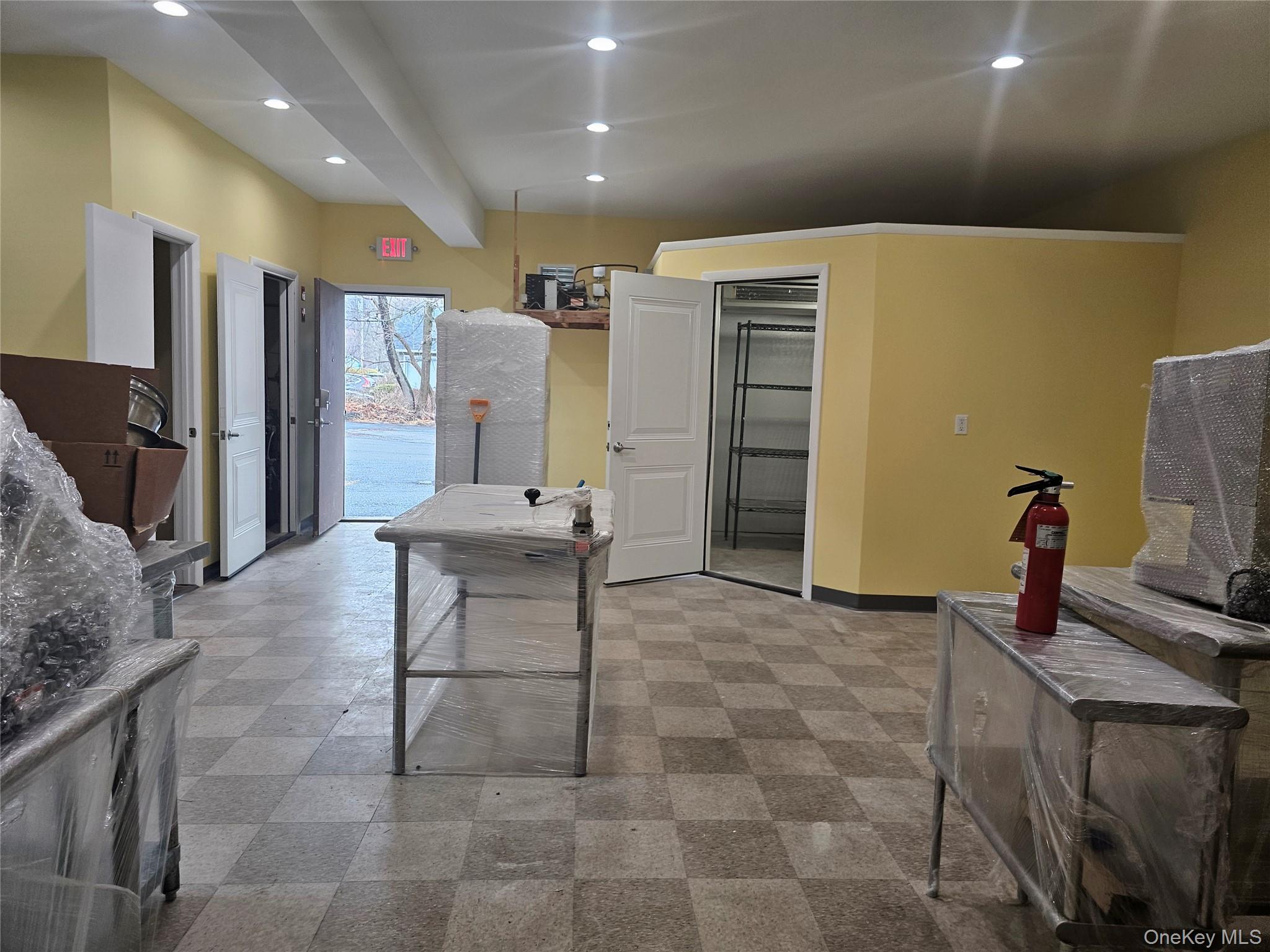 Kitchen with recessed lighting and beam ceiling