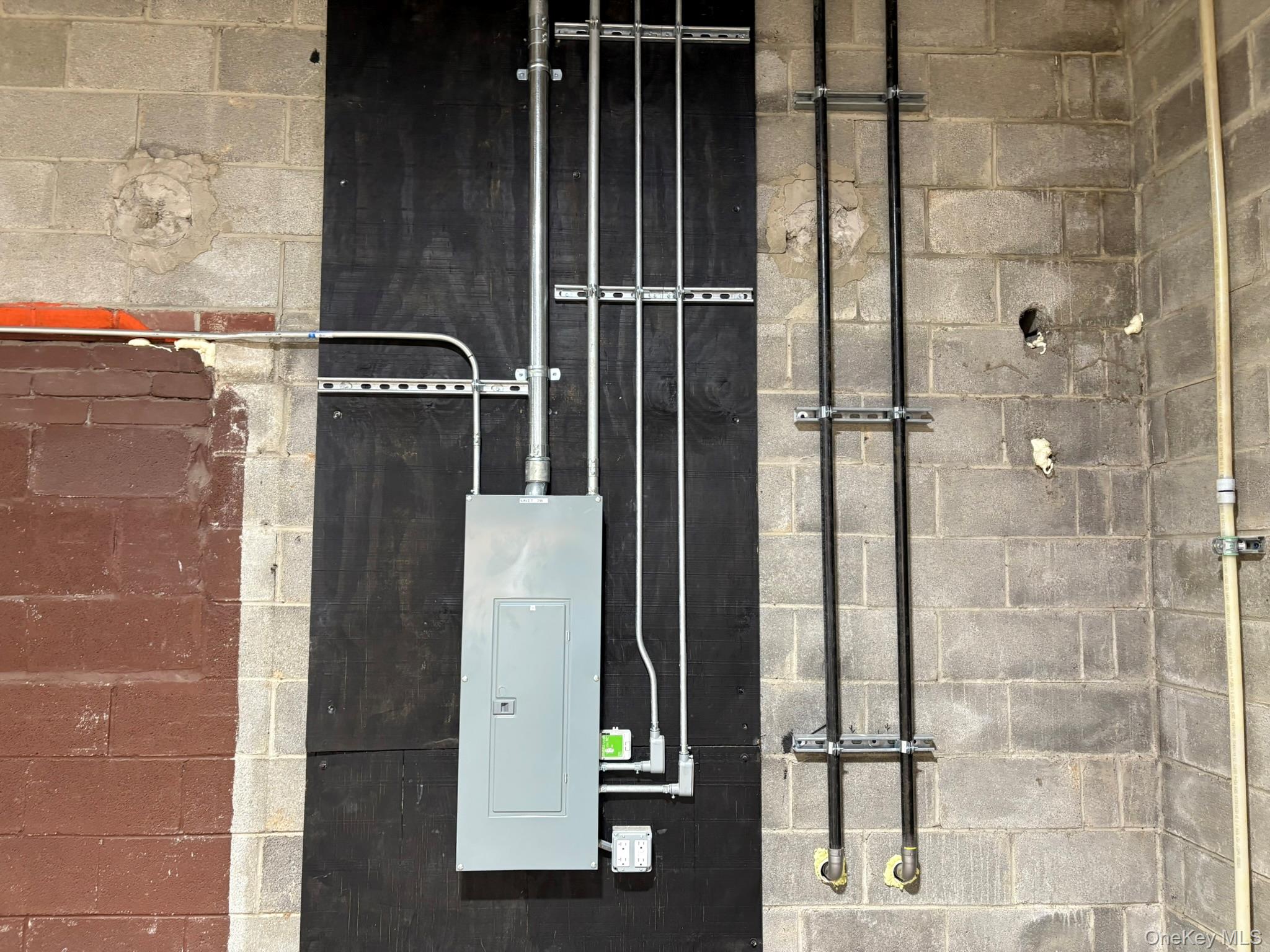 Utility room with electric panel