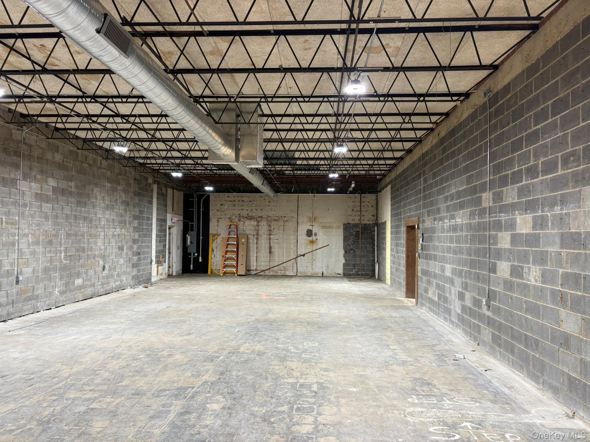 Garage with concrete block wall