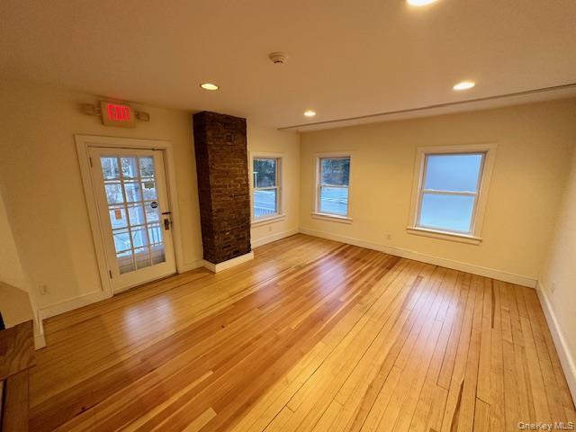 Spare room with recessed lighting and light wood-style flooring