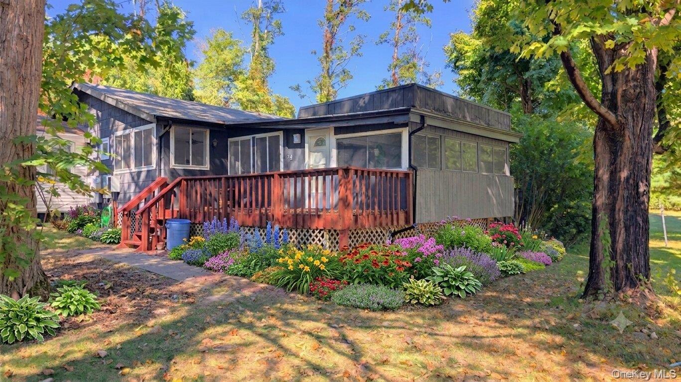 AI rendering of this home with potential flower beds