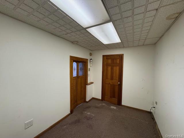 View of the second room and the entry to a smaller room before the bathroom.
