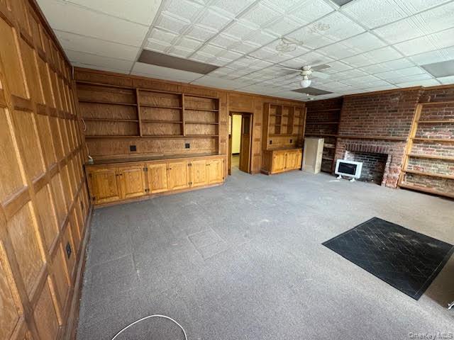 Interior of the main space with built-in wall shelving...