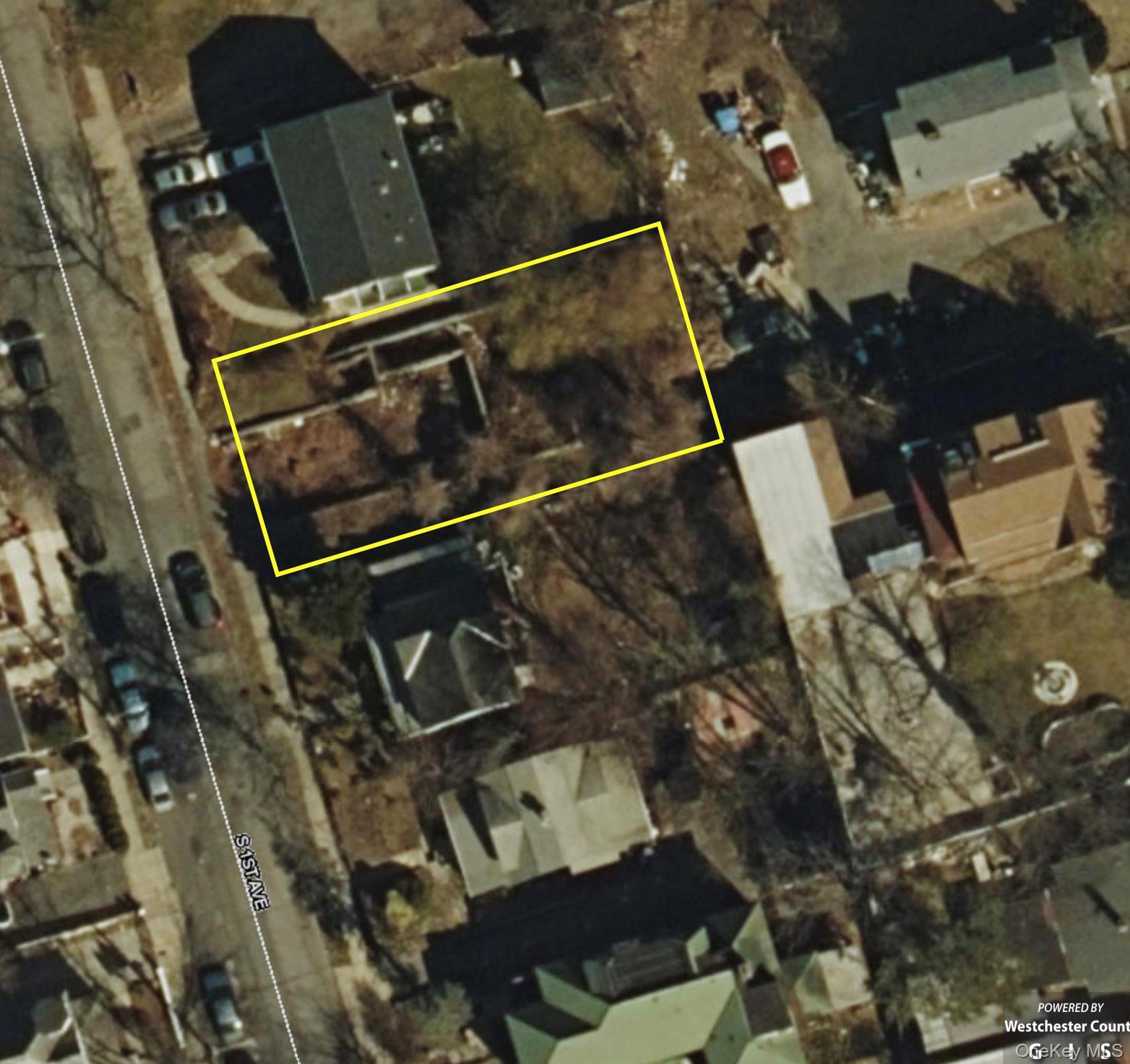 Aerial map of property and surrounding area with property parcel outlined