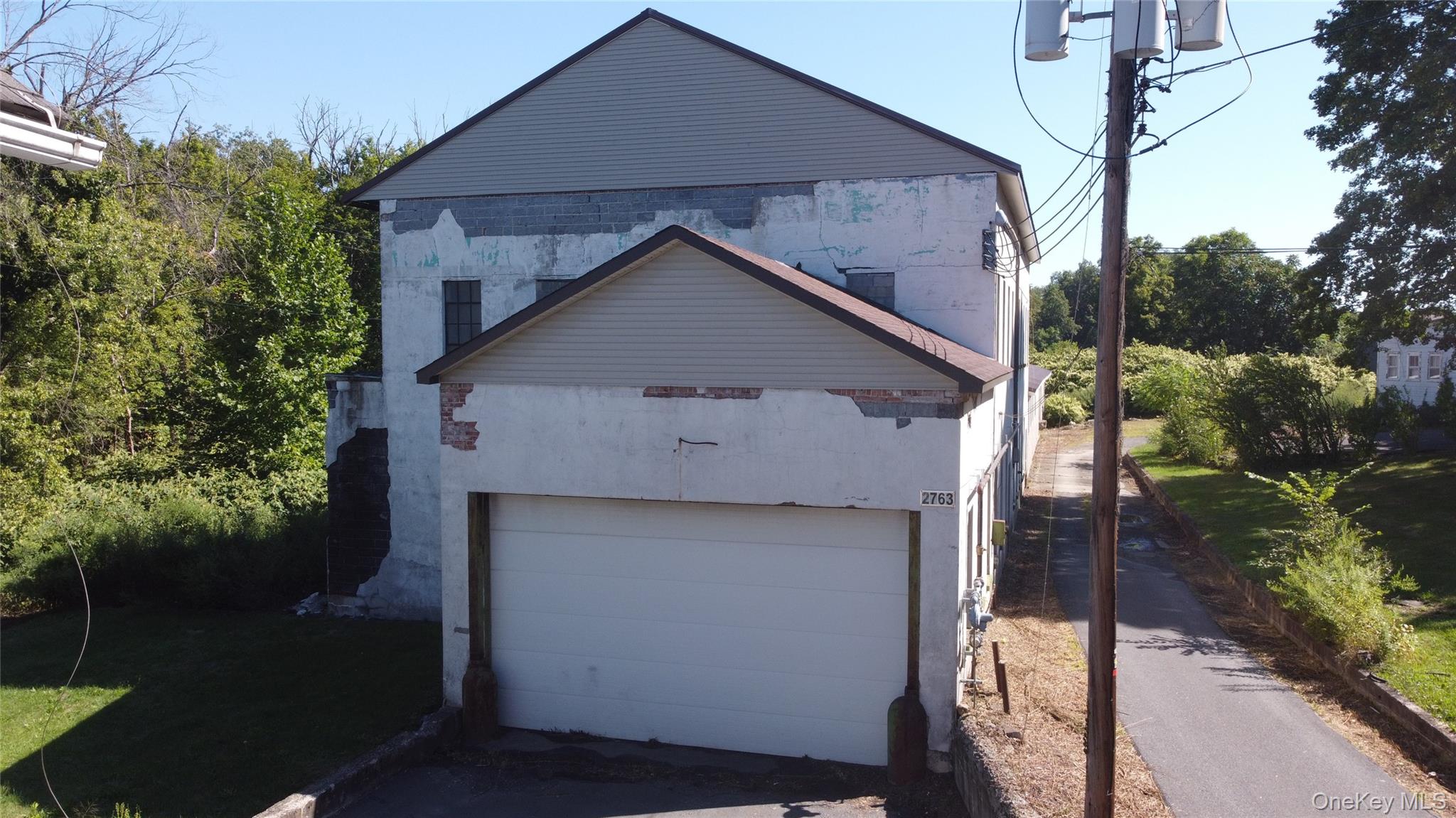 View of home's exterior with a garage
