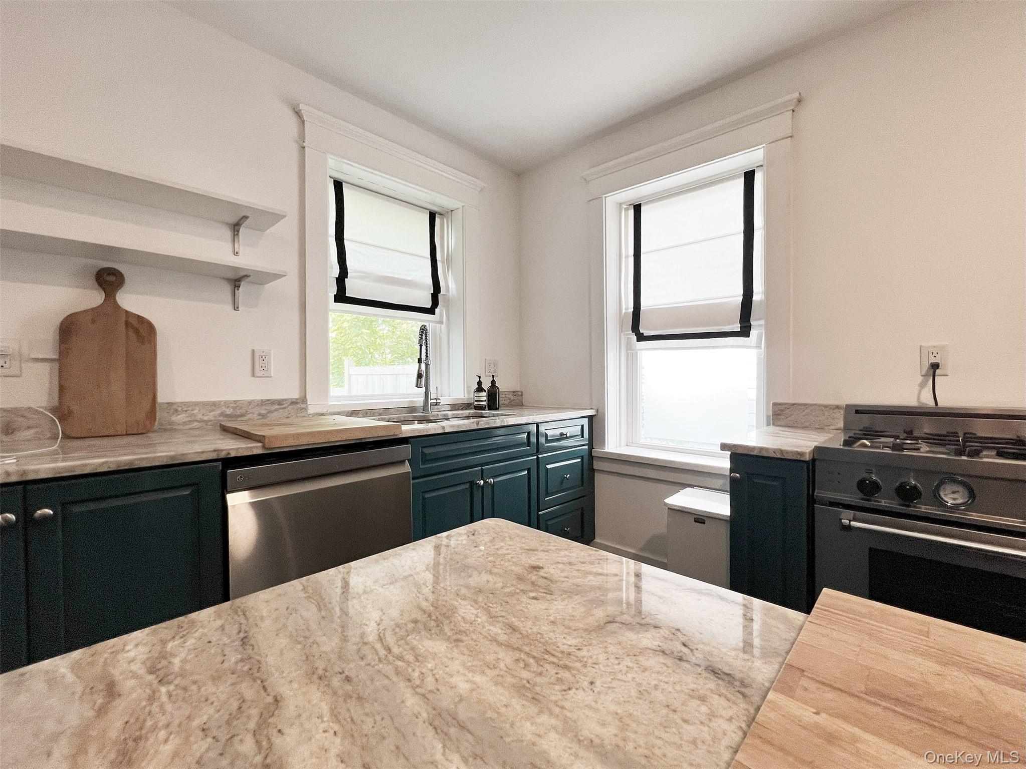 Kitchen Bertazzoni Miele appliances marble Counters