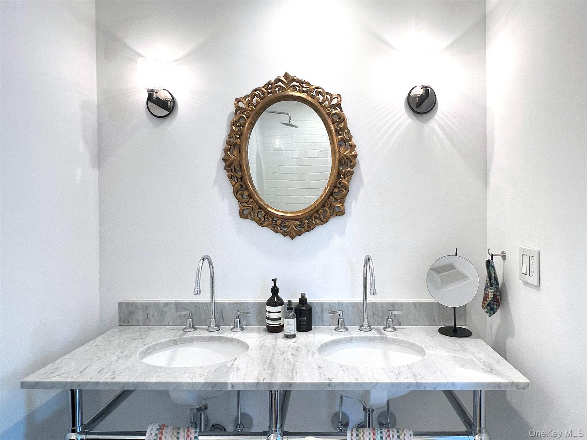 Full bath with Marble double vanity
