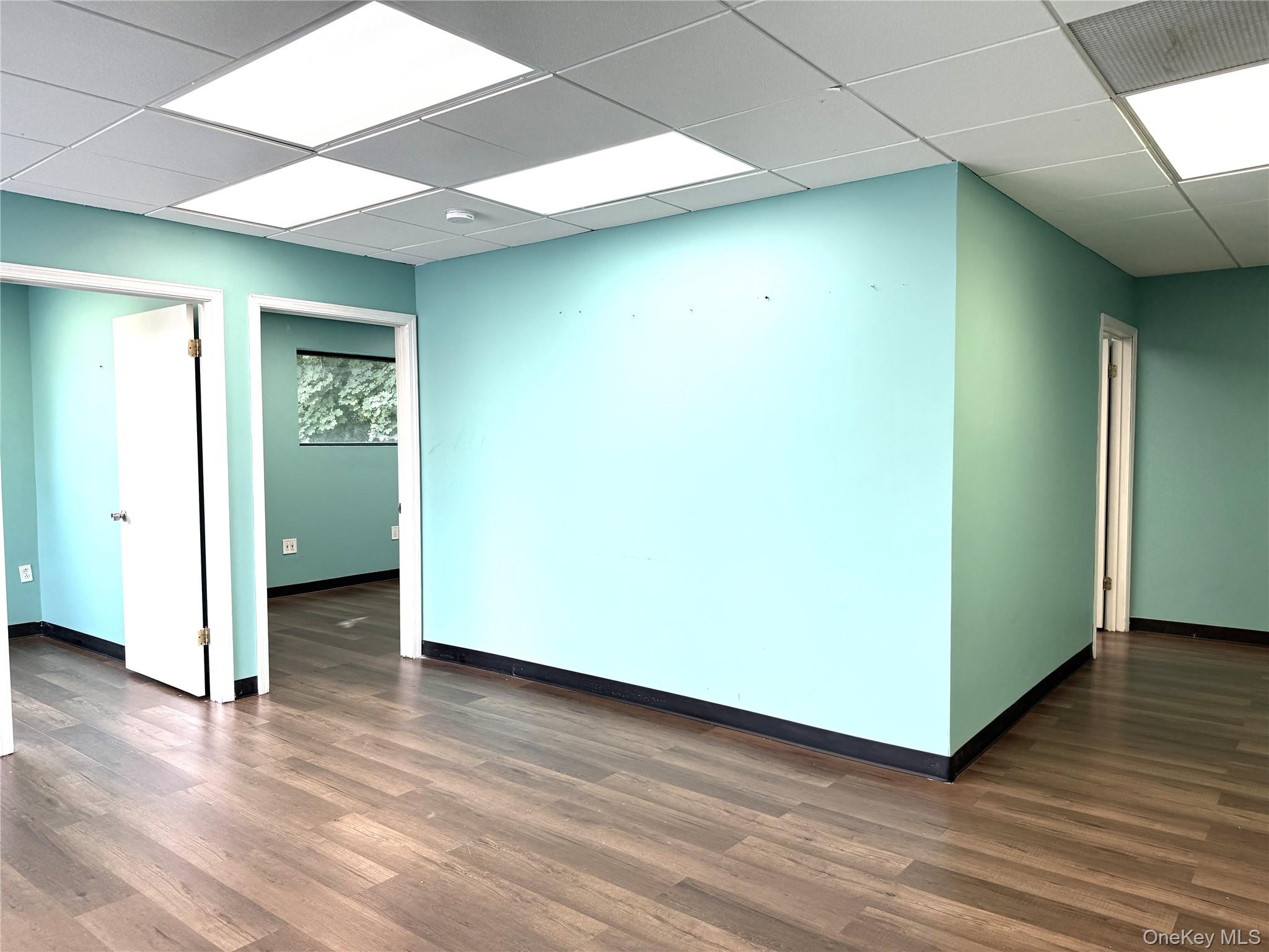 To the left of the large reception area are 2 offices.