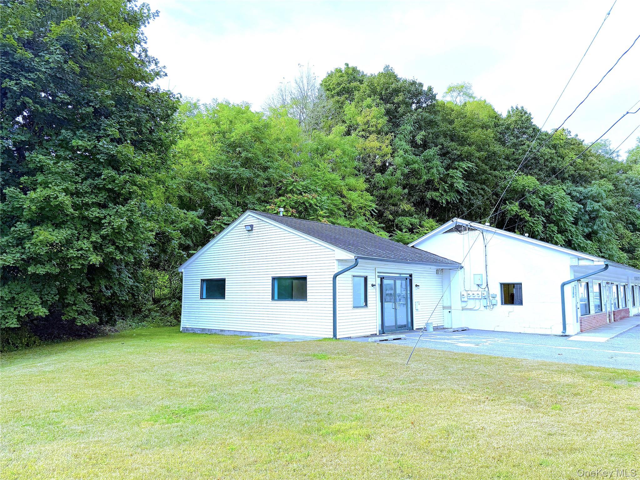 Wide entry doors open to a spacious reception room/office. 4 separate offices, and an ADA handicap bathroom and front entry. Central air, your own electric meter.
