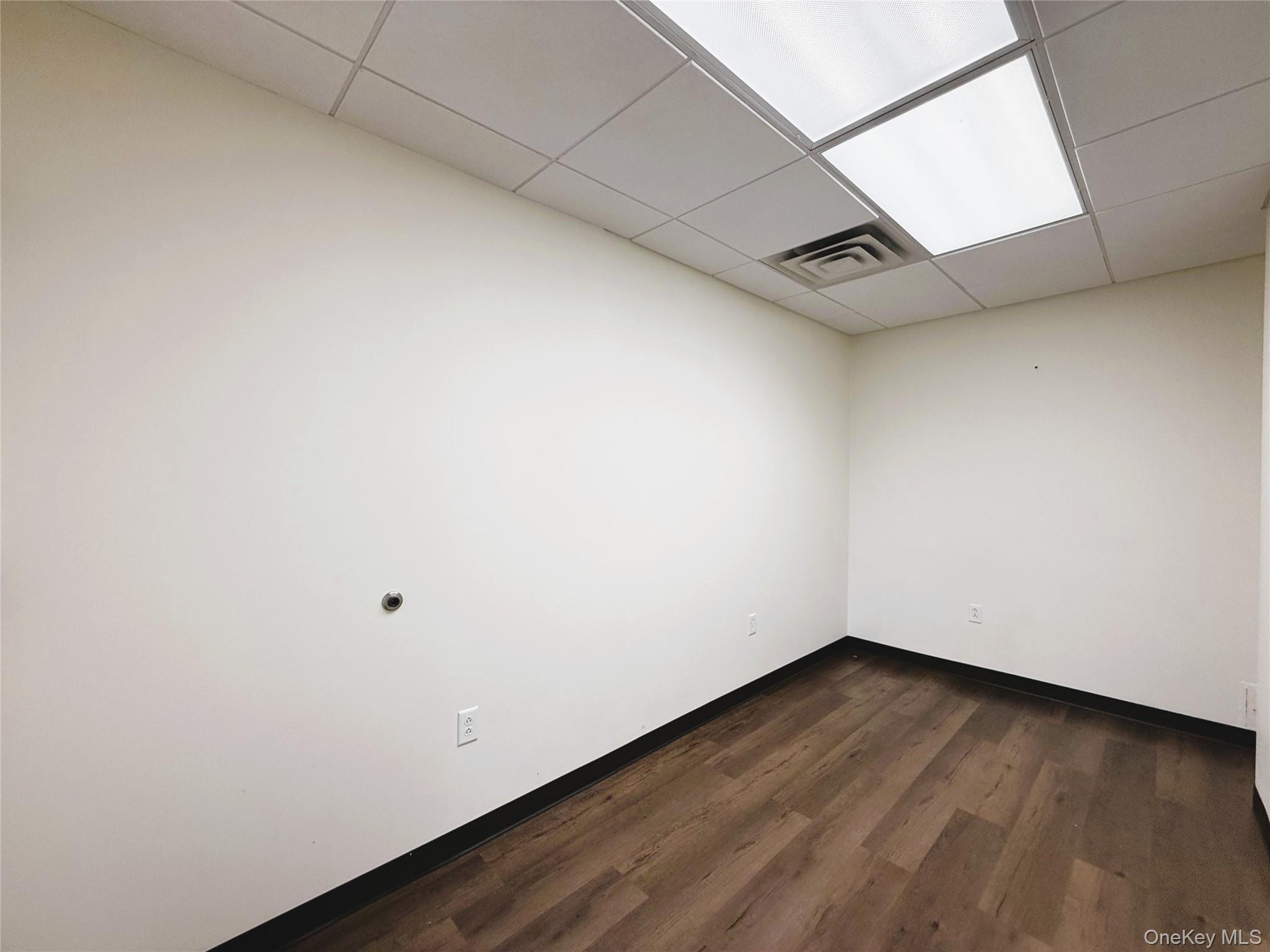Office with closet is off the reception area.
