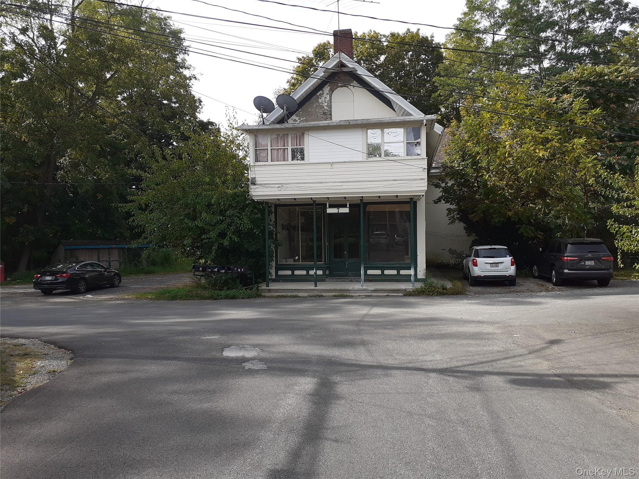 View of front of property featuring a chimney