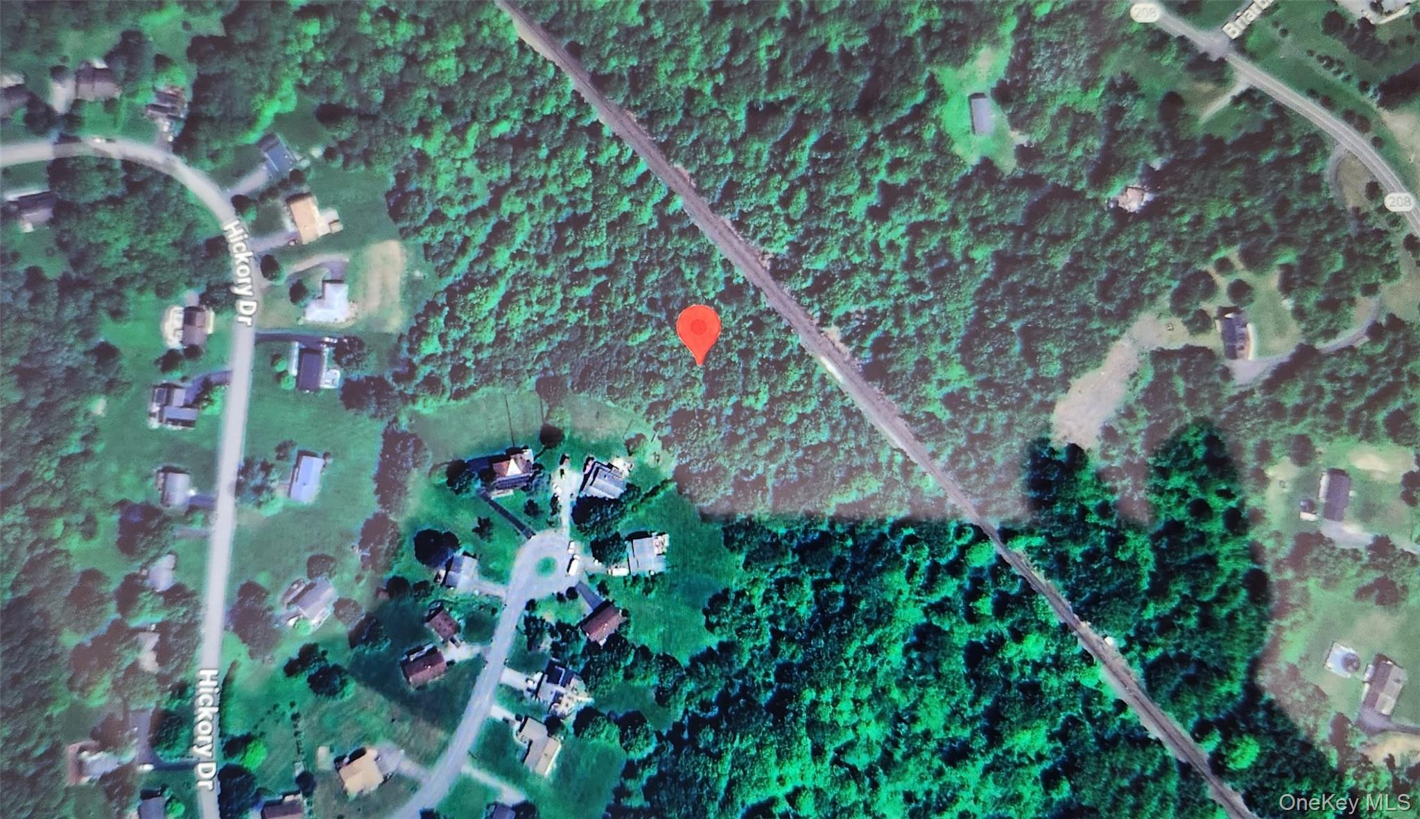 Aerial overview of property's location with rural landscape