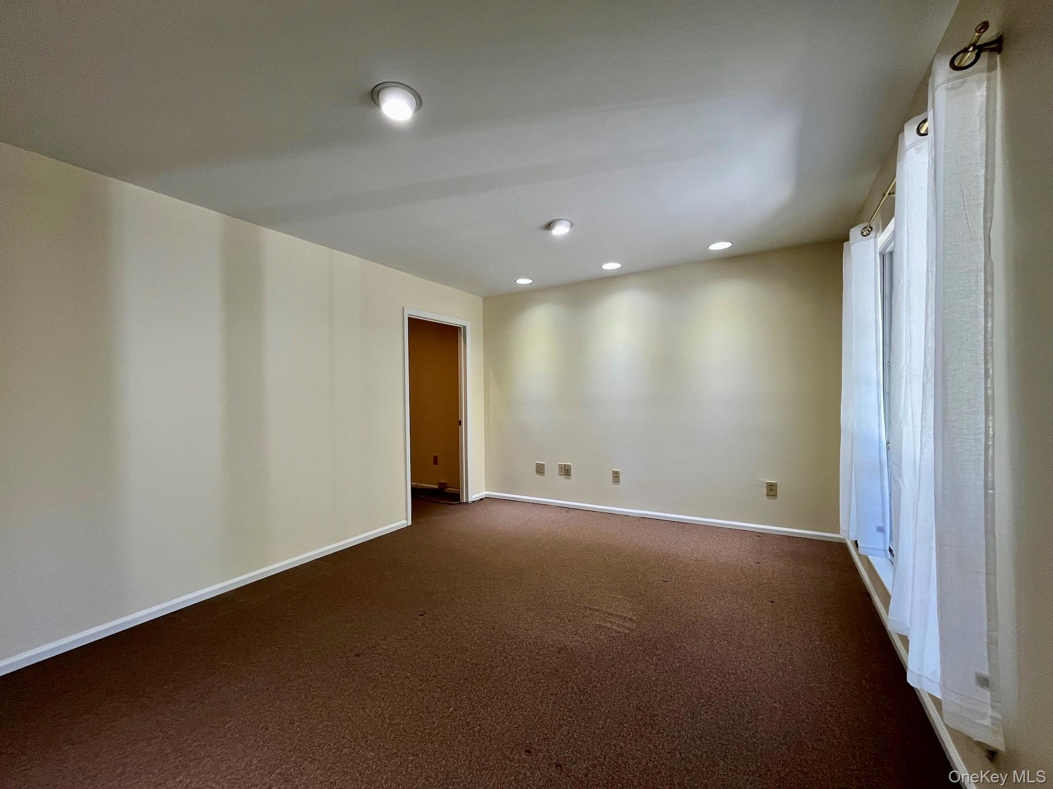 Front room at entrance; possible reception area or office space