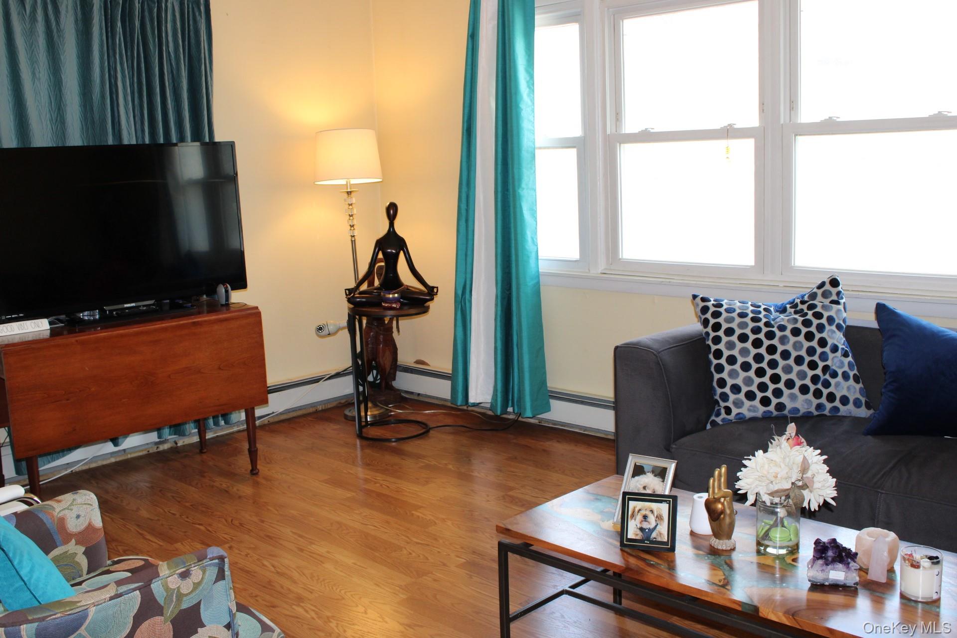 Living area featuring wood finished floors