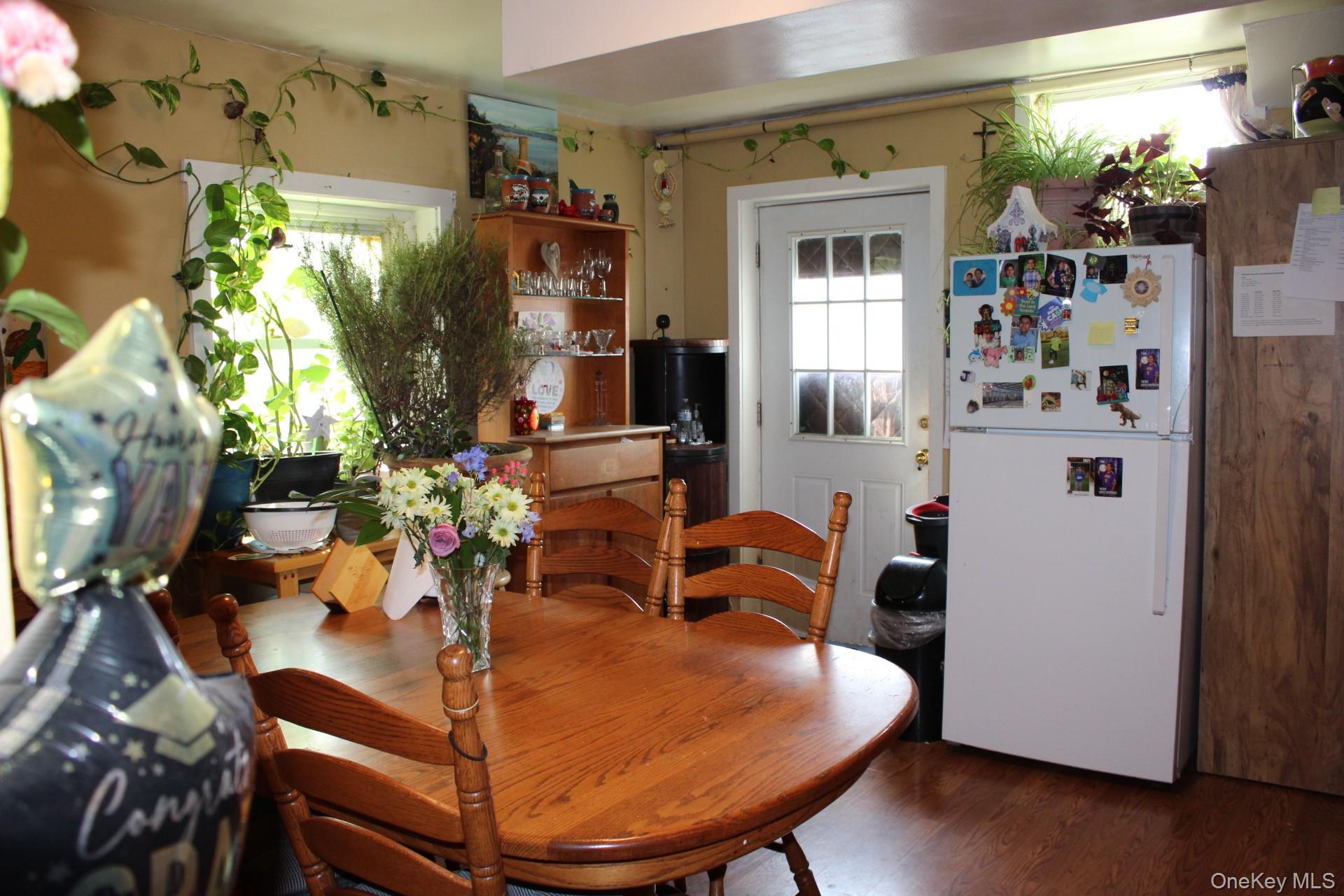 Dining room with wood finished floors