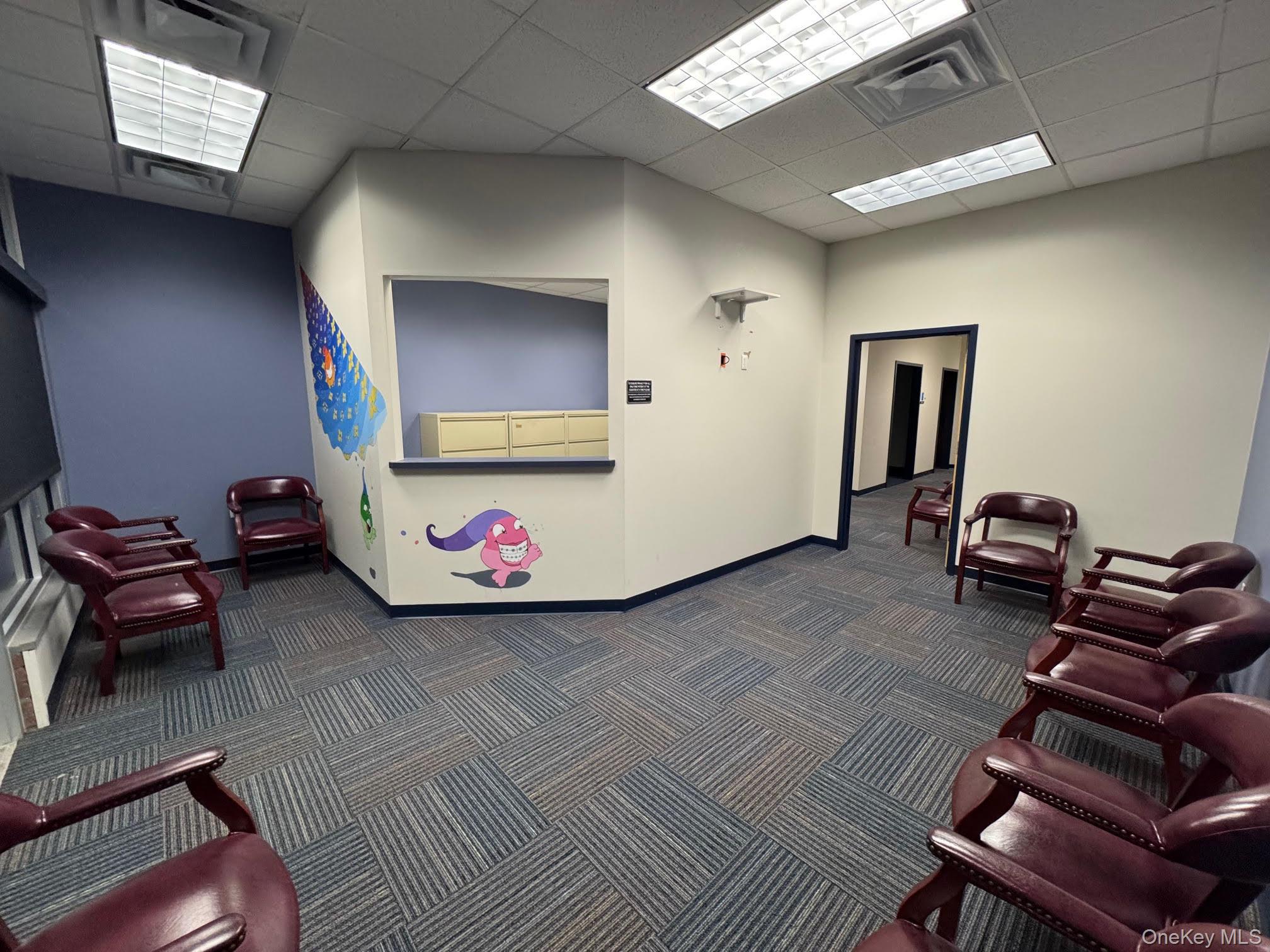 Welcome area with a drop ceiling