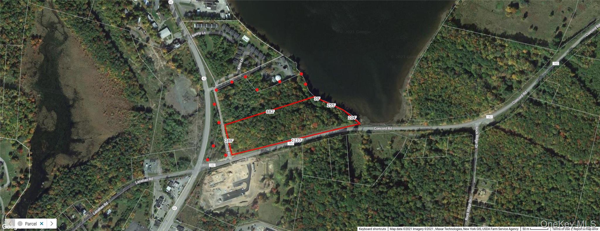 Aerial view of property's location with property parcel outlined