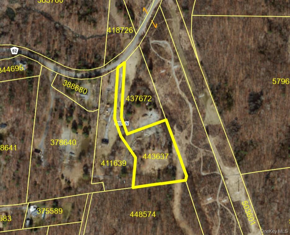 Aerial overview of property's location featuring property parcel outlined