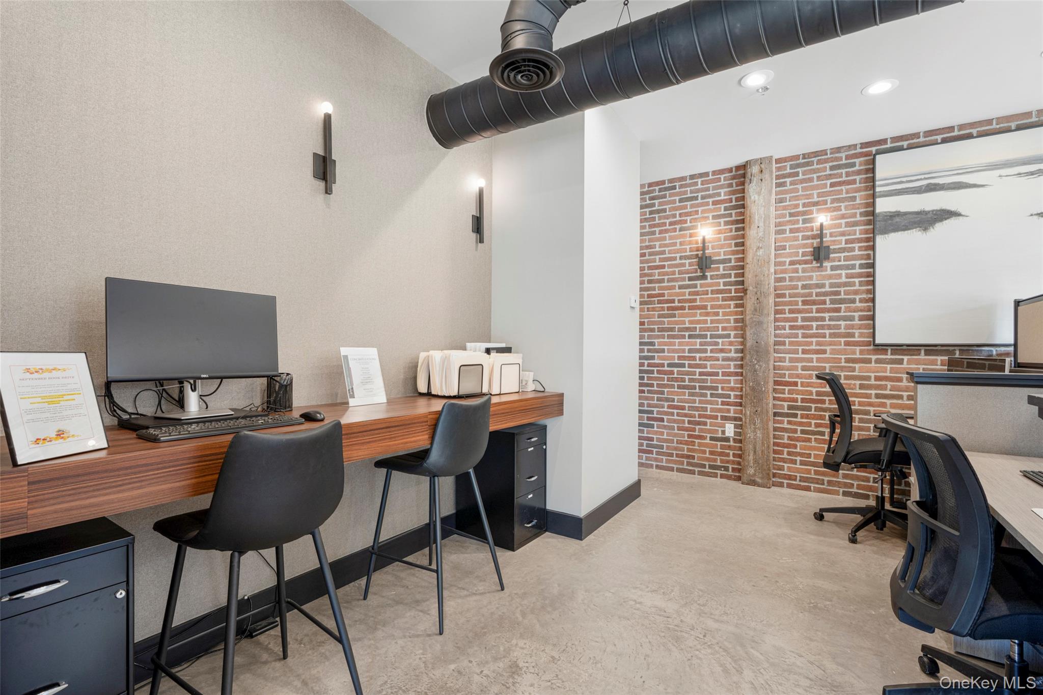 Office with brick wall