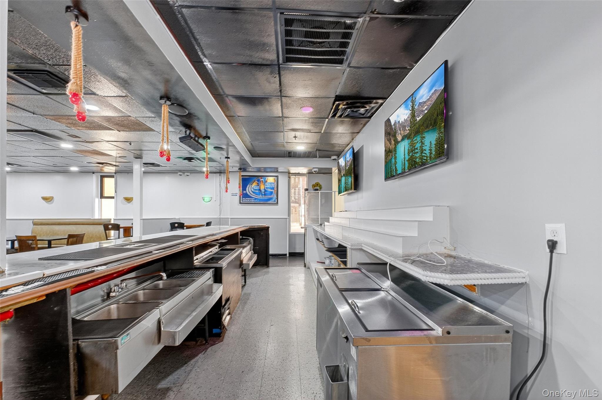 Kitchen featuring stainless steel countertops