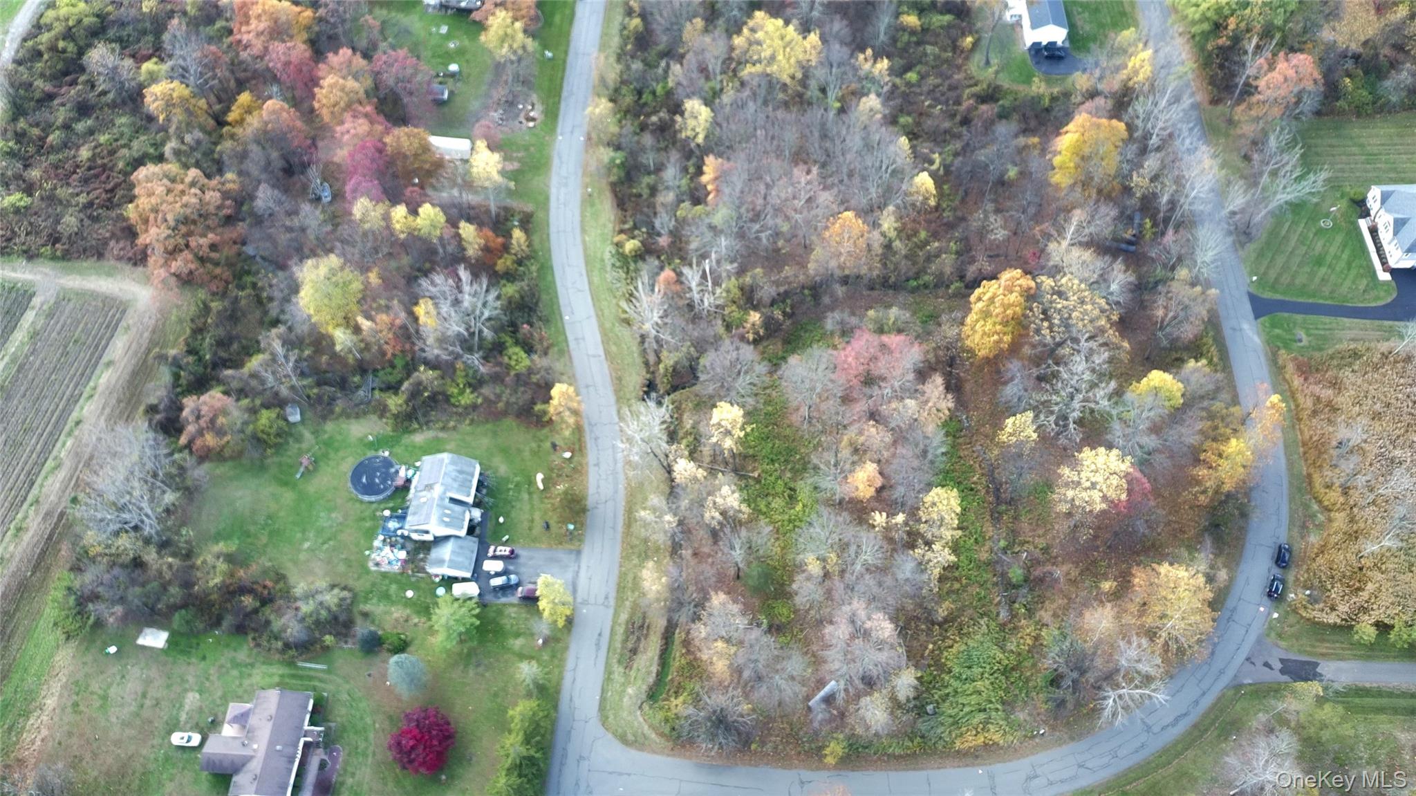Aerial overview of property's location with rural landscape and abundant farmland