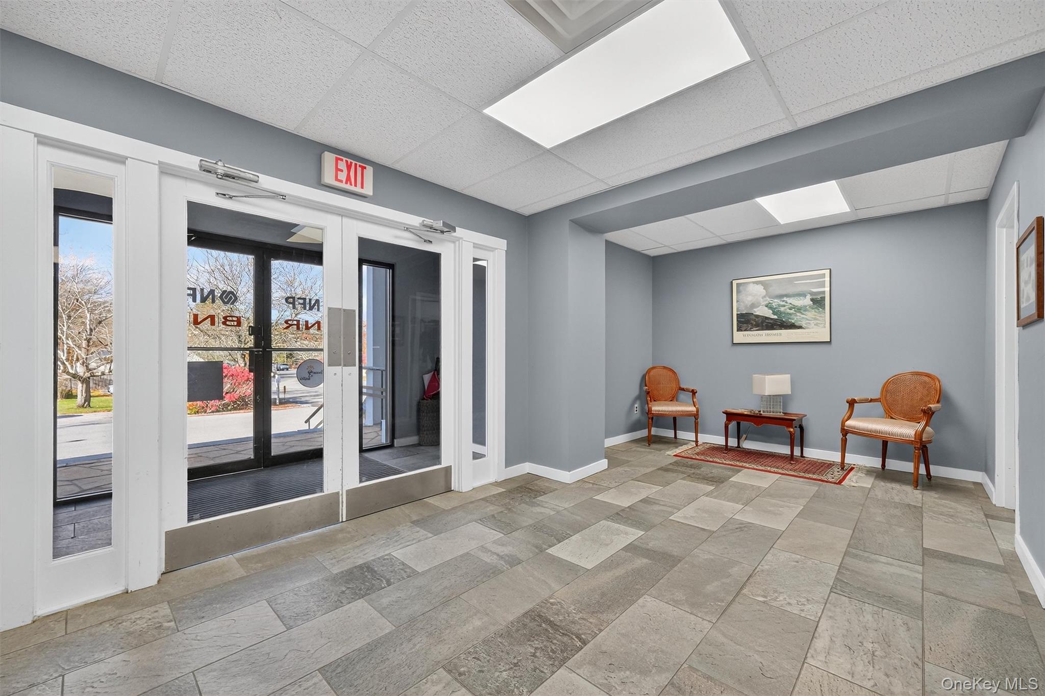 Building lobby featuring a paneled ceiling