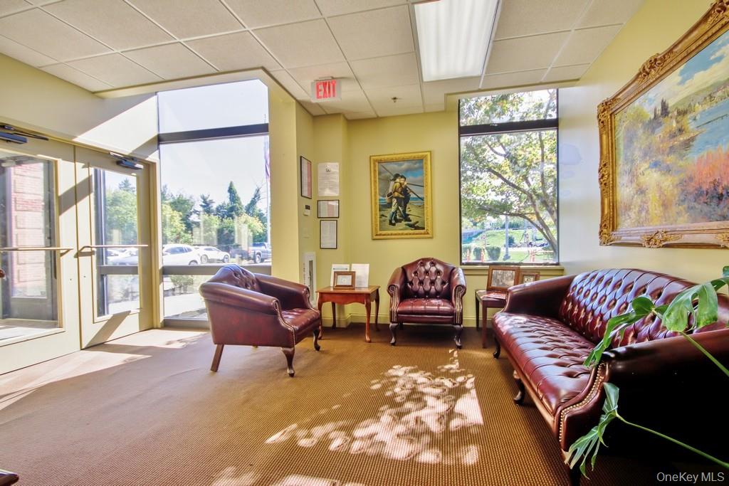 Common area featuring a drop ceiling
