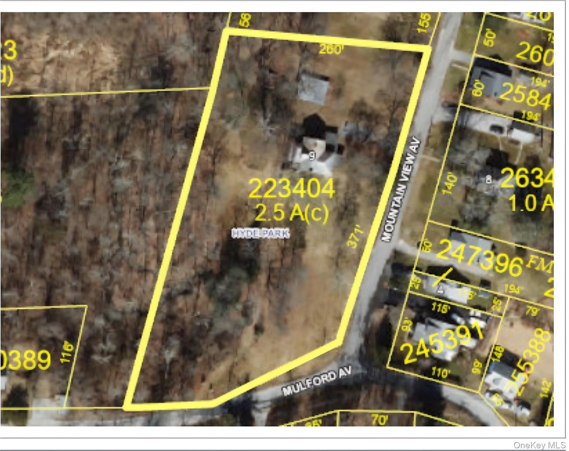 Aerial map of property and surrounding area with property parcel outlined
