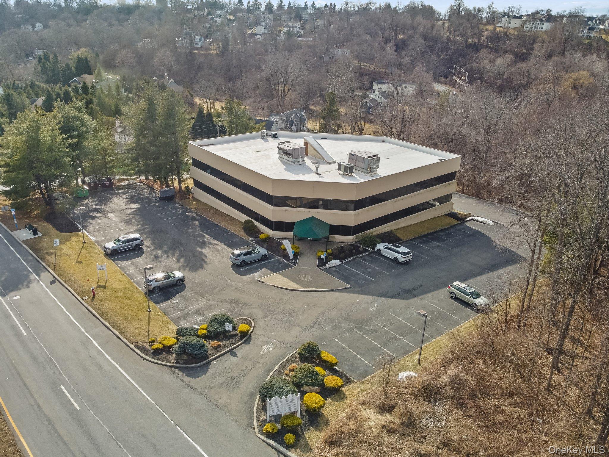 Drone / aerial view of a tree filled landscape