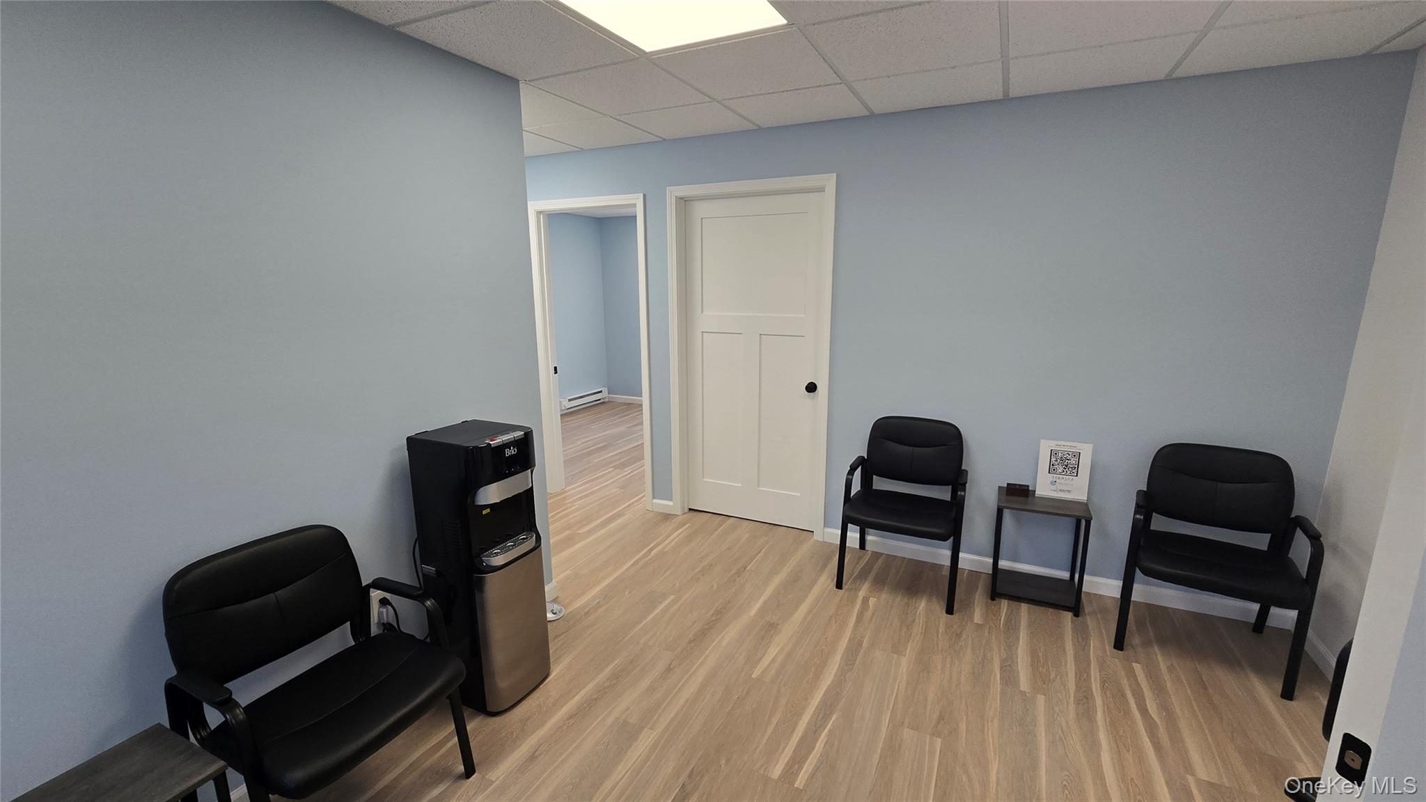 Shared Waiting Room. OPEN DOOR IS UNIT FOR LEASE.