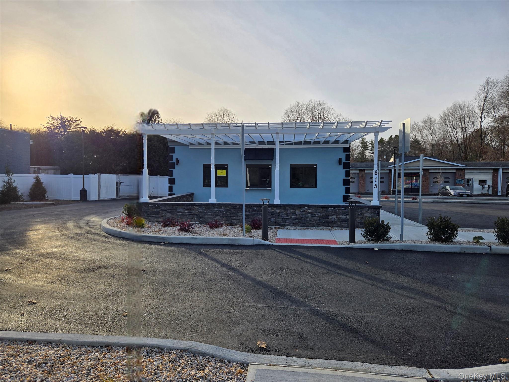 View of front of home featuring stucco siding