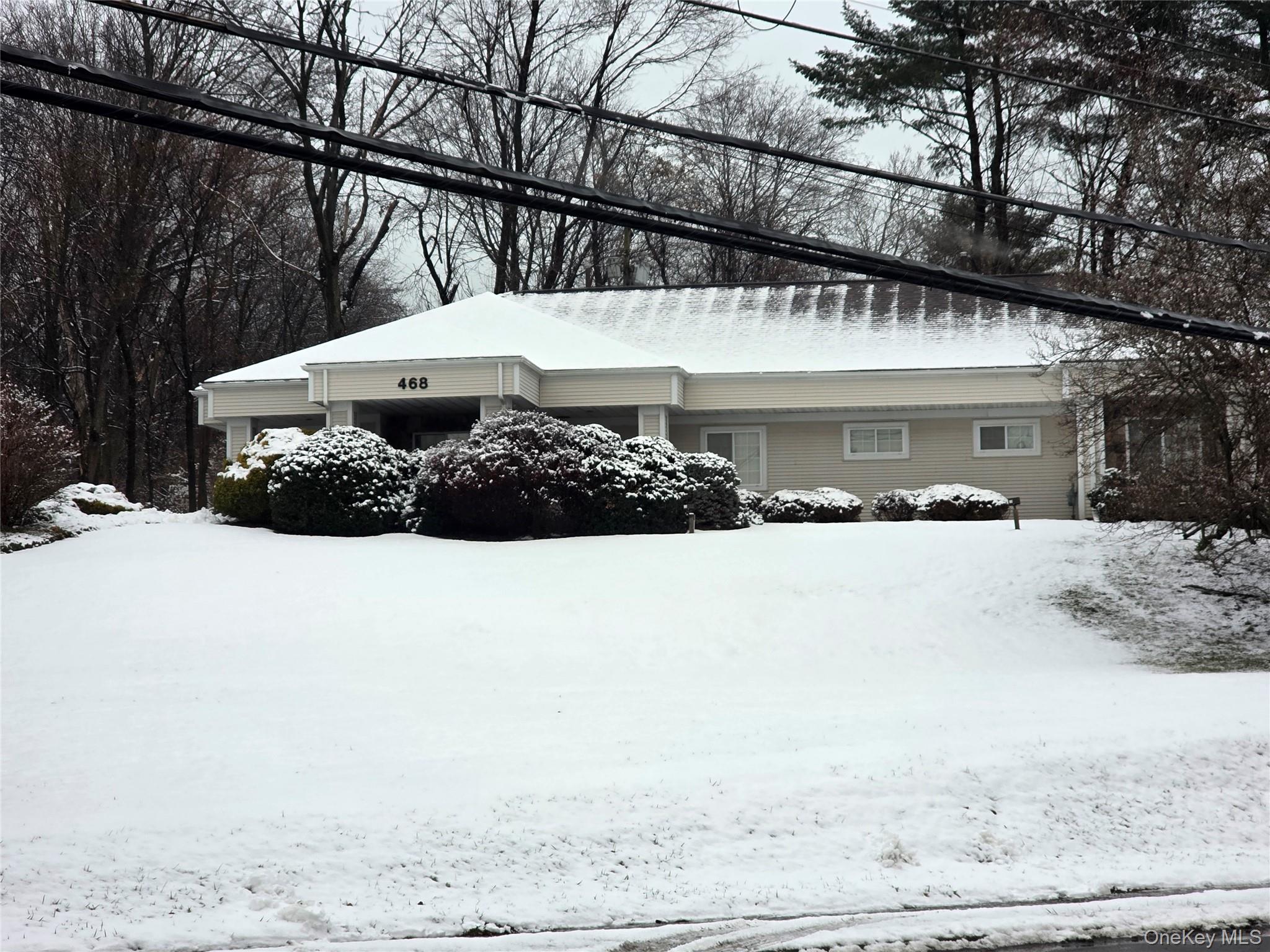 Front view from Gidney Ave.  Off street parking on left