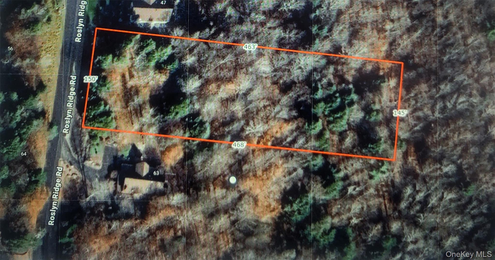 Aerial view of property's location with property parcel outlined