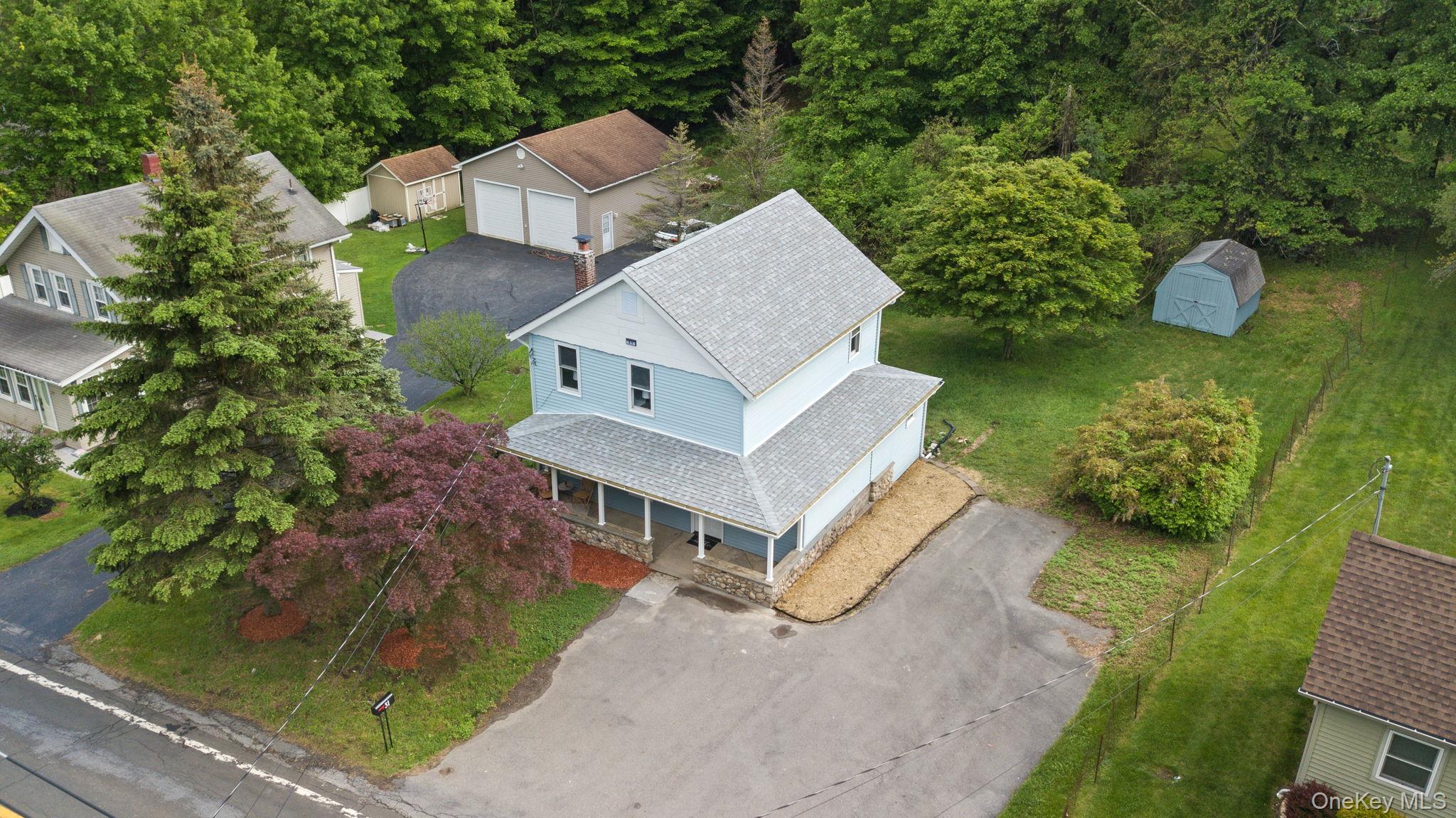 Aerial view of property and surrounding area