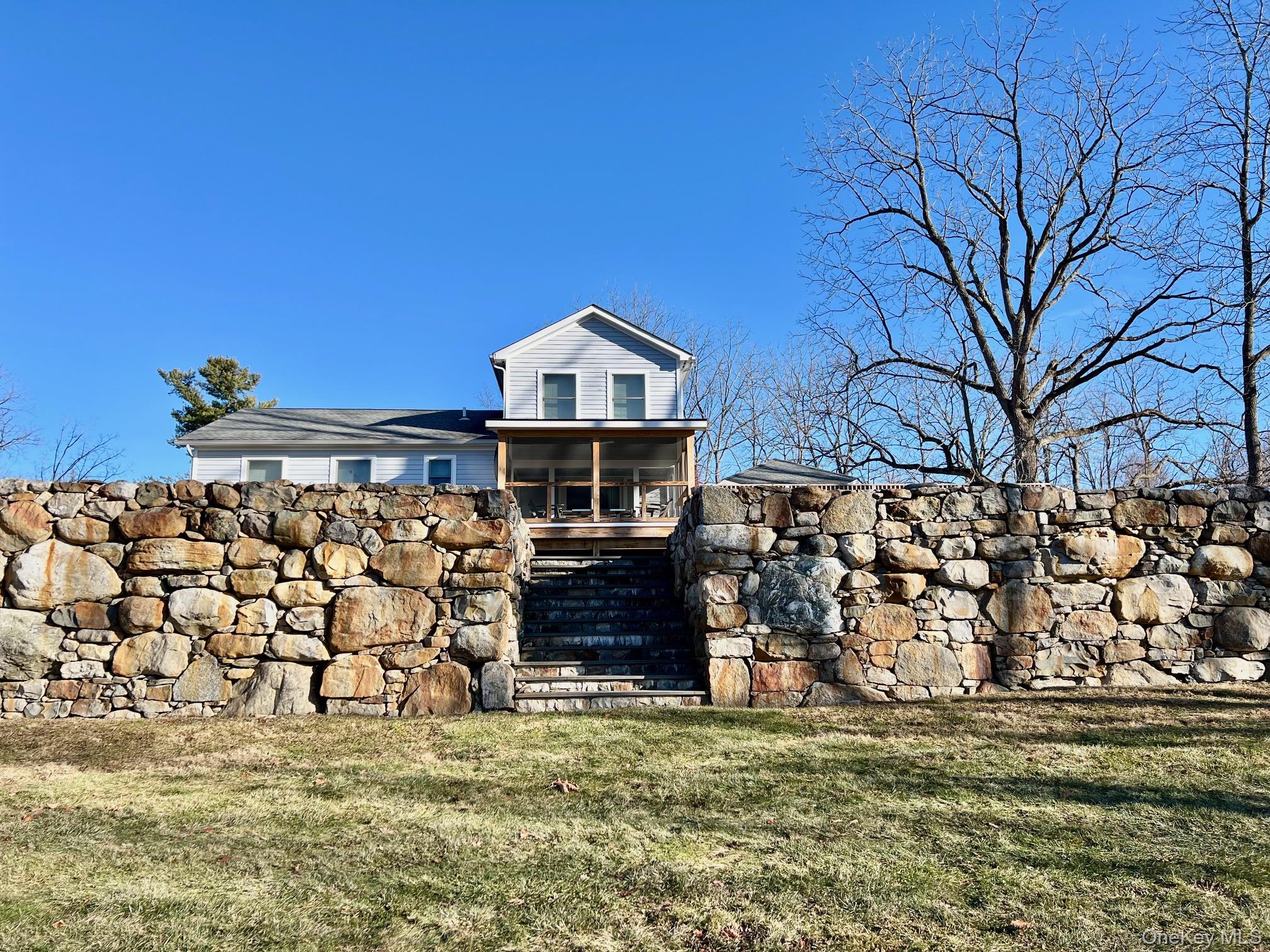 Charming house sited off the road with a great yard and wonderful views
