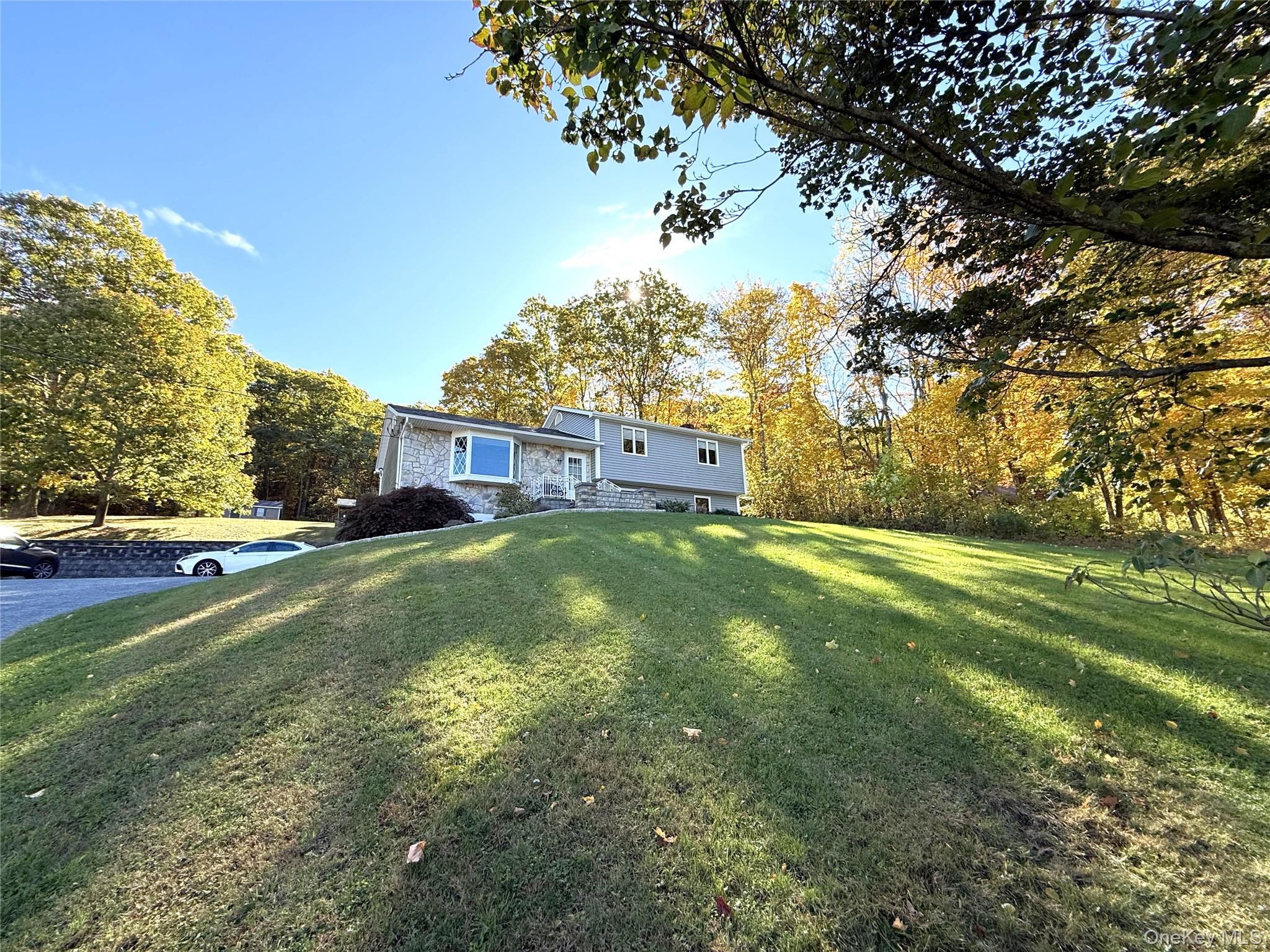 Set back from the road and located on 2.6 lovely acres.