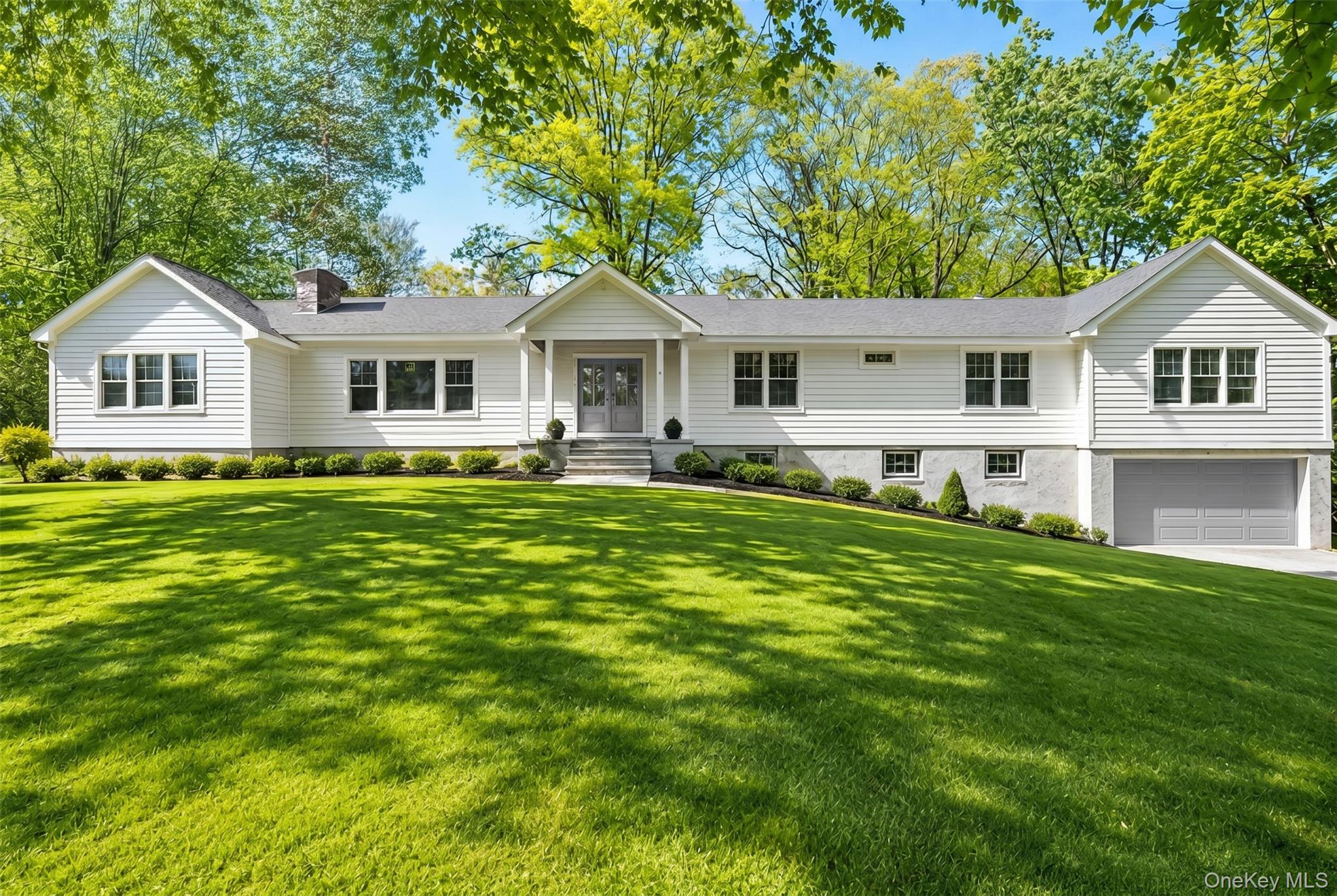 Completely Renovated Modern Ranch in Quaker Ridge (virtually staged garage door)
