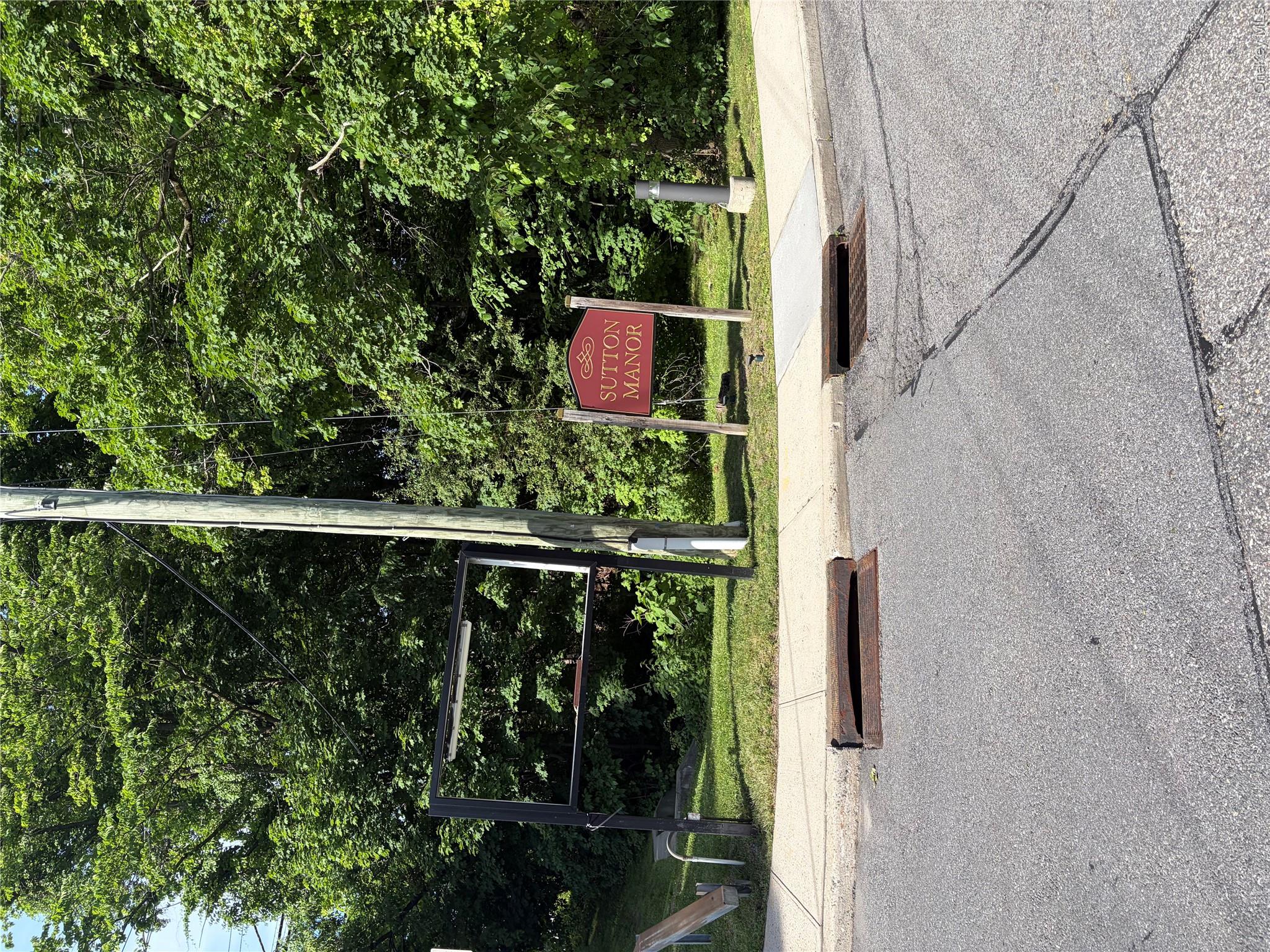 Entrance from Bedford Road with Existing Sign Frame for Signage up to the Restaurant