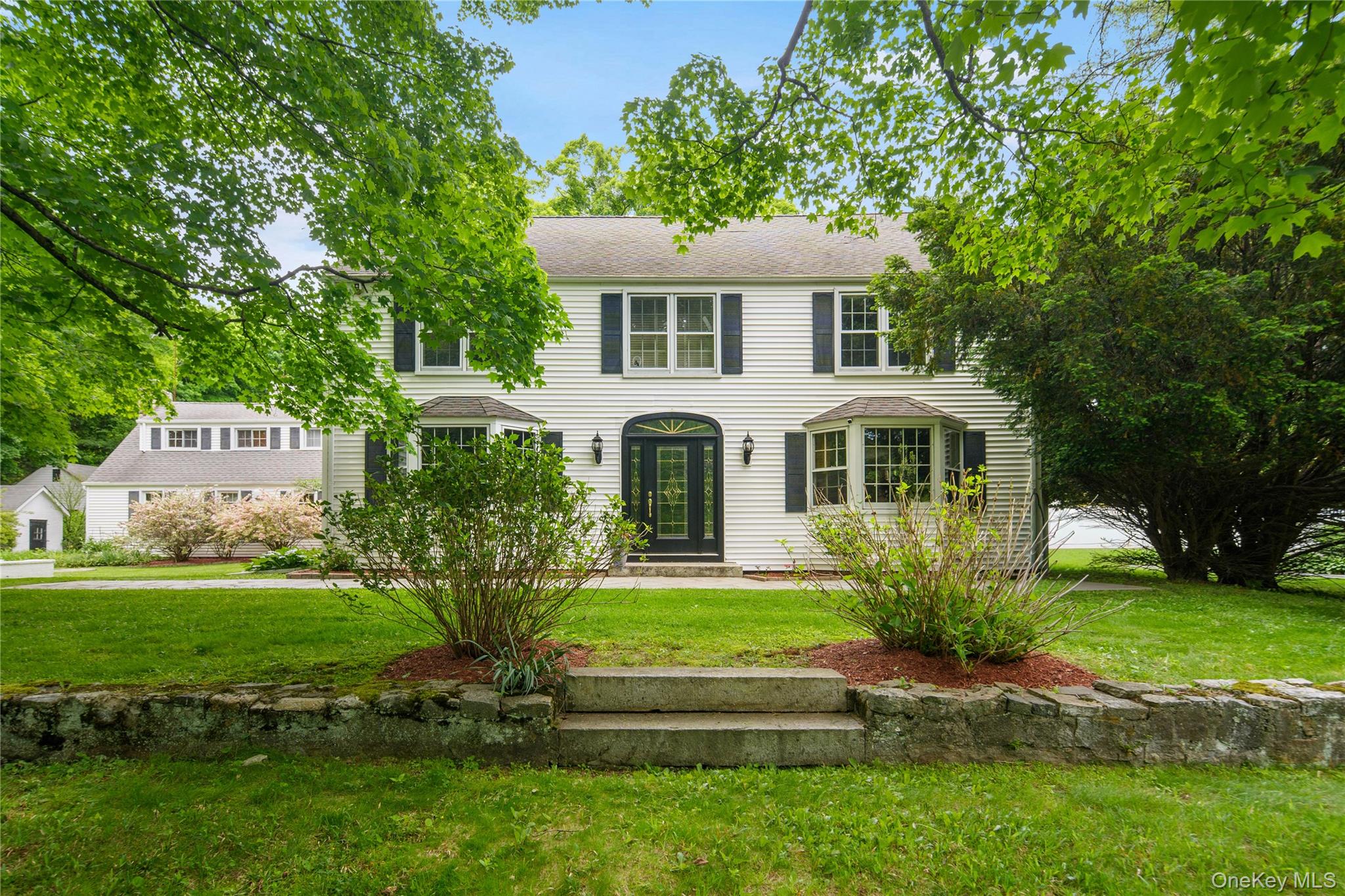 Welcome to 36 Granite Rd, a vintage farmhouse colonial with a professional office suite and additional studio apartment and meditation cottage set back on 2 acres with pool, firepit and gardens