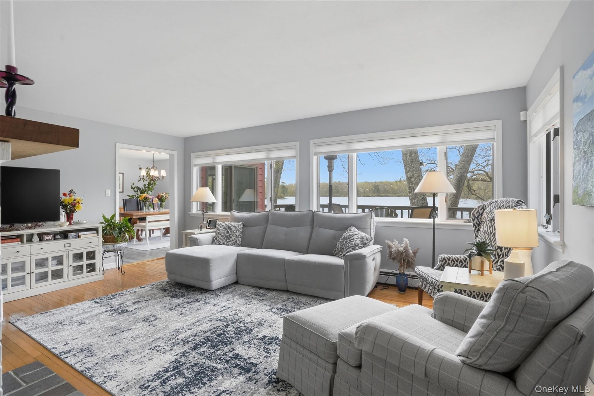 Living rooms flows into dining room.