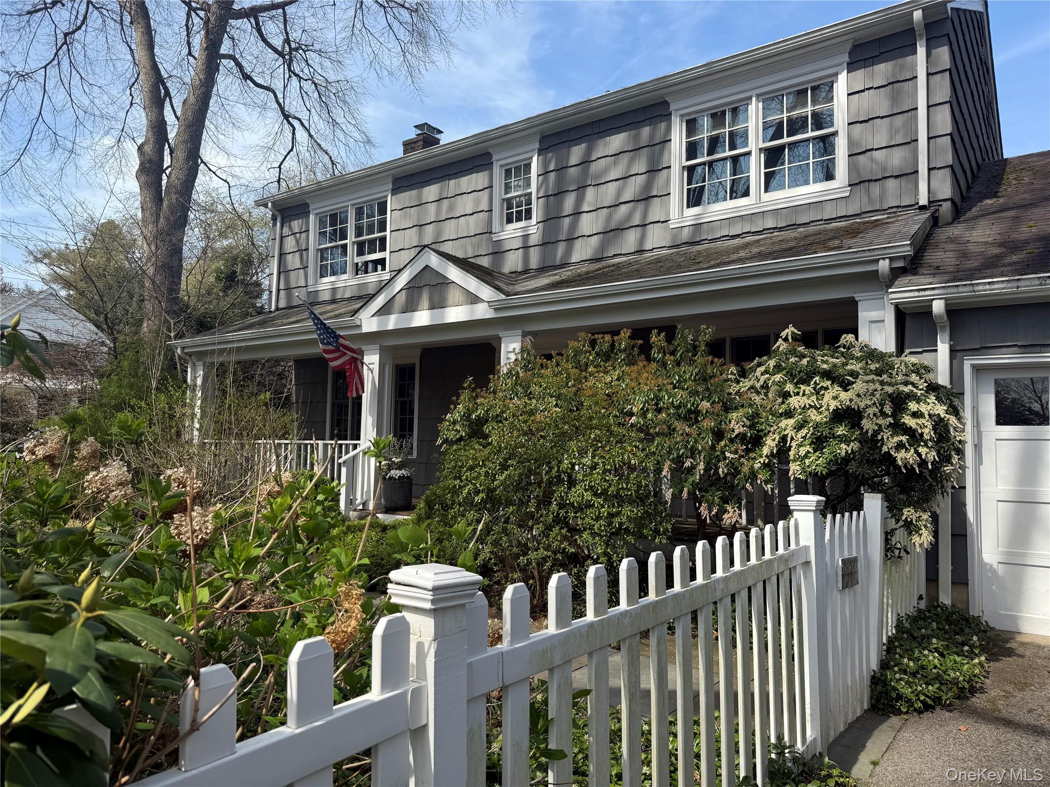 Front of house with private porch entrance