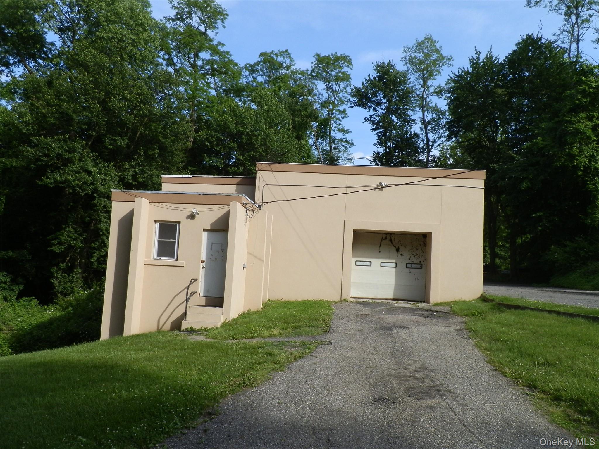 Front office door and garage entry.