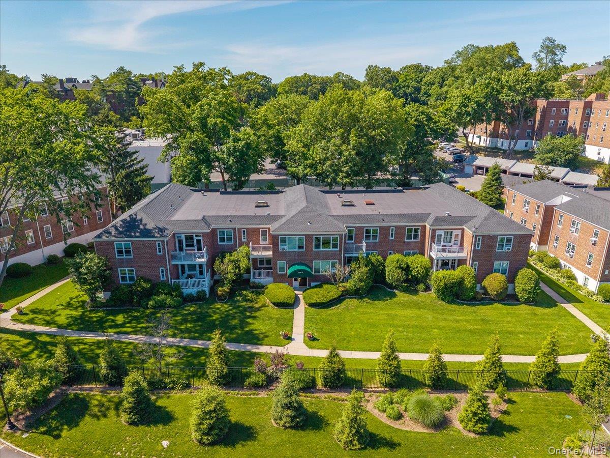 Welcome to 920 Pelhamdale Avenue, Unit B1A, a garden-style apartment set within the beautifully landscaped Caroline Garden community.