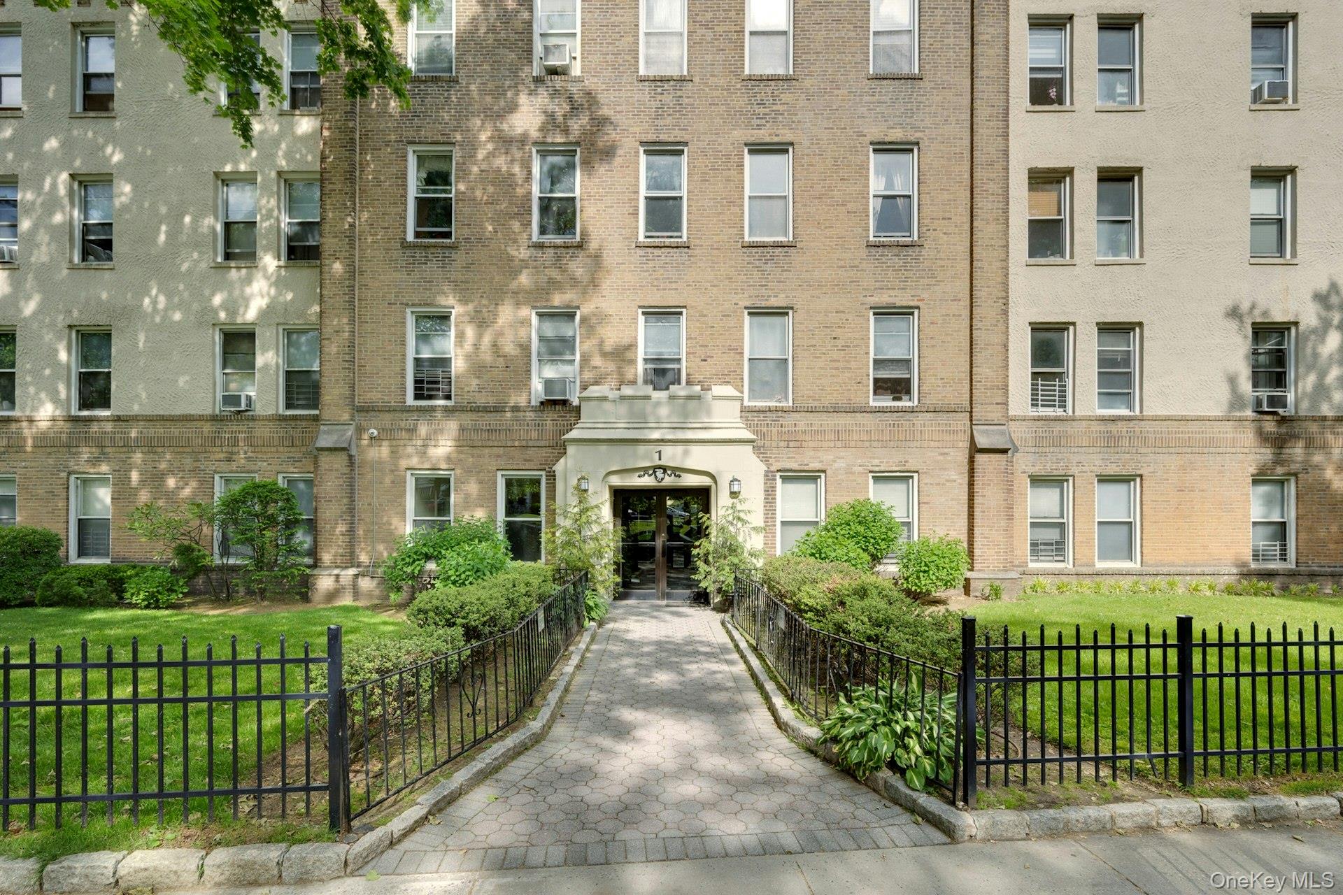 Beautiful lawn in front of the building at 472 Gramatan Ave., Unit A3.