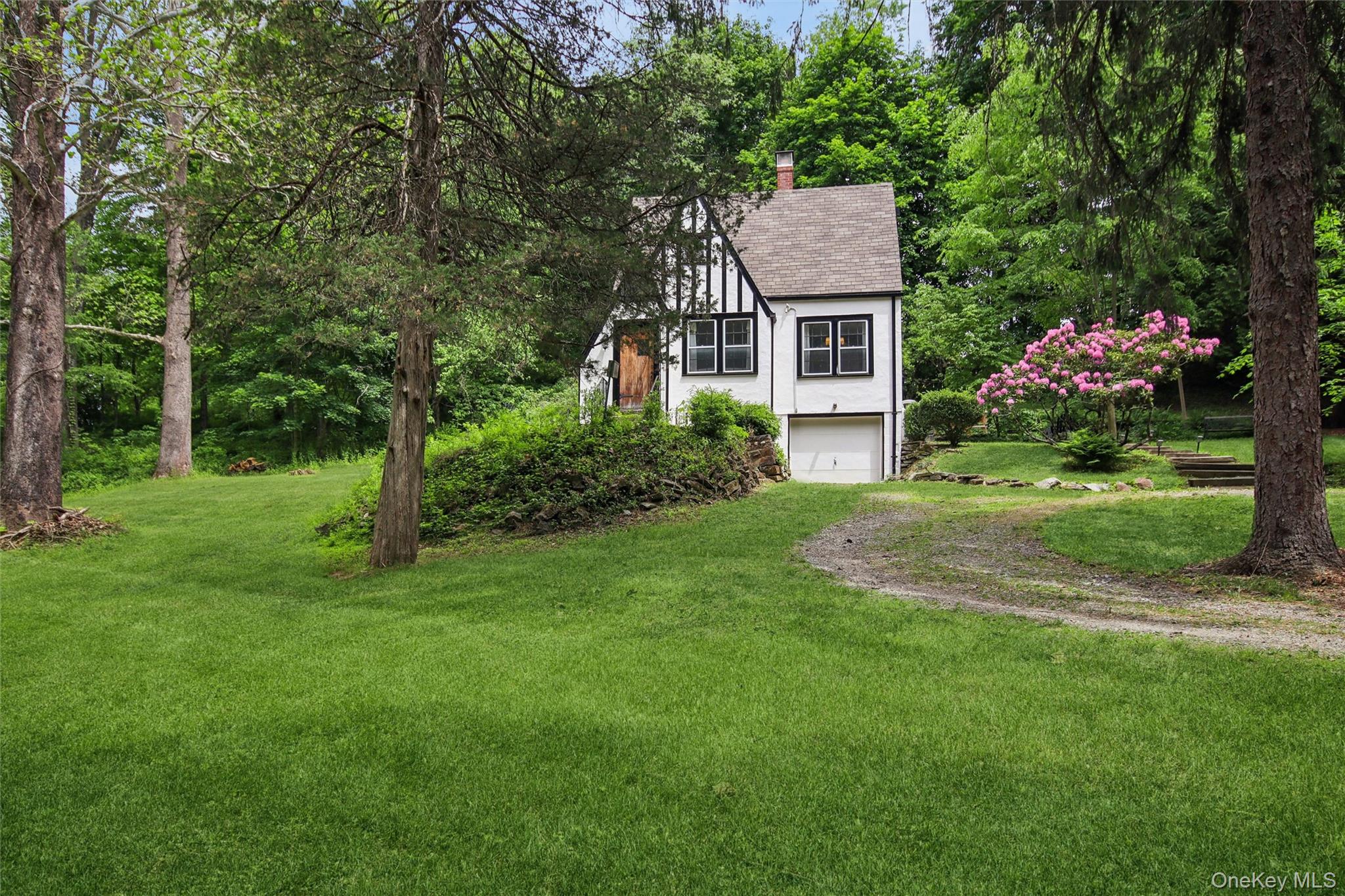 Charming Tudor w/ striking curb appeal