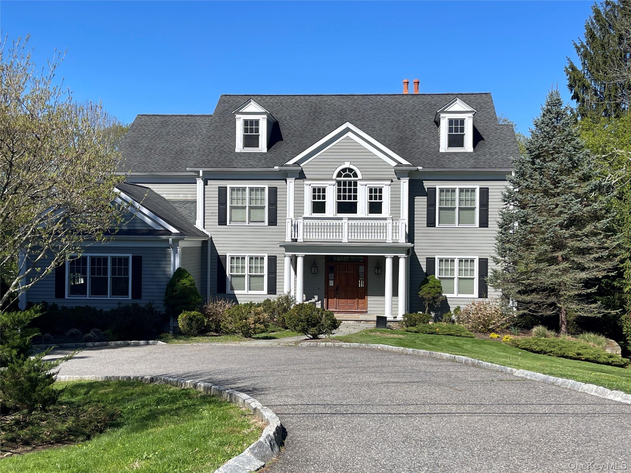 Welcome to 77 Byram Ridge Rd, Armonk, just minutes from the town pool and town center. This 6000 sq ft center hall colonial on an acre plus of flat, lush property has all the right rooms in all the right places. High end construction, details and finishes