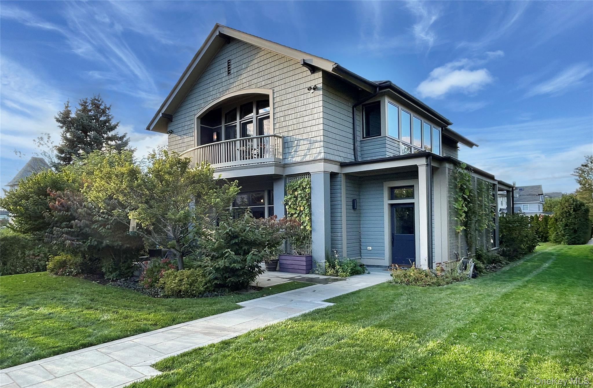 Welcome to 10 Sherman Avenue - Back of home with primary bedroom suite balcony