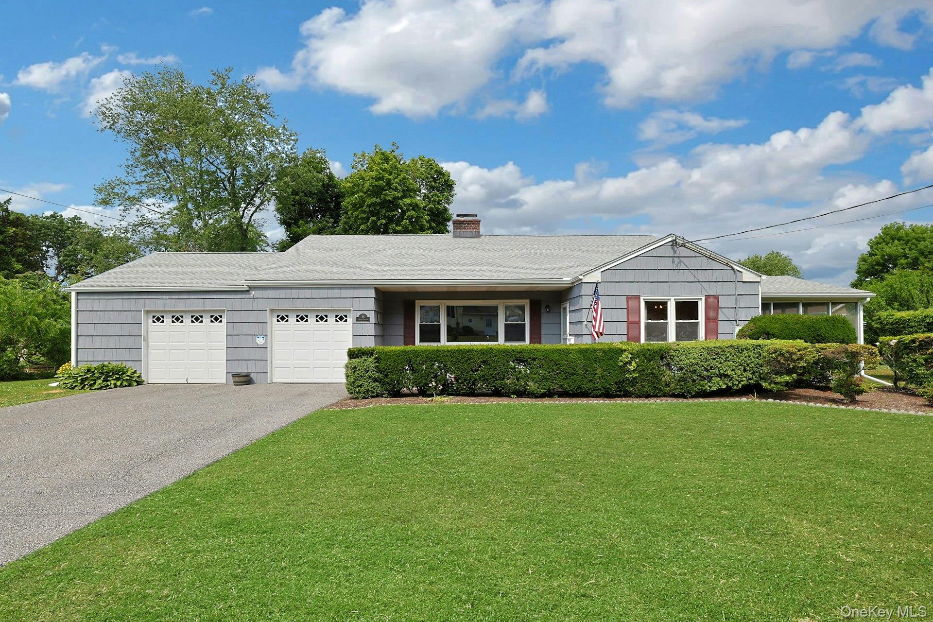 Charming cape with 2 car garage